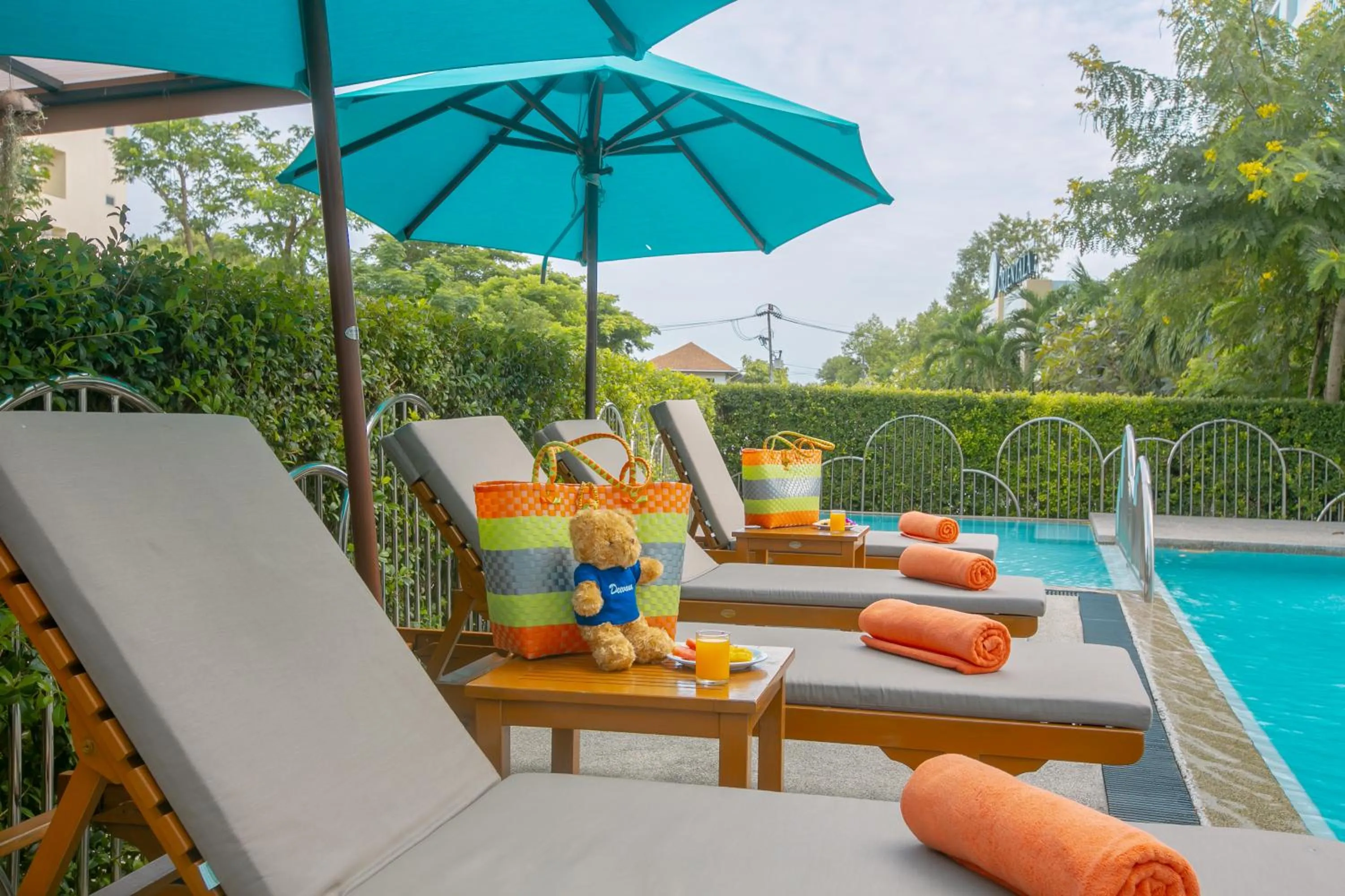 Swimming pool in Recenta Suite Phuket Suanluang