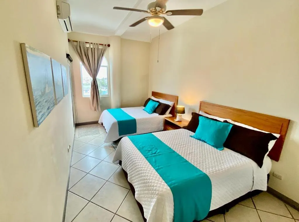 Bed in Torre Mar Galapagos Boutique Suites