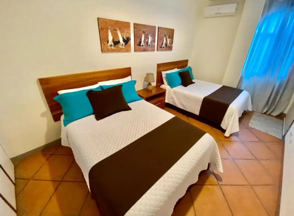 Bed in Torre Mar Galapagos Boutique Suites