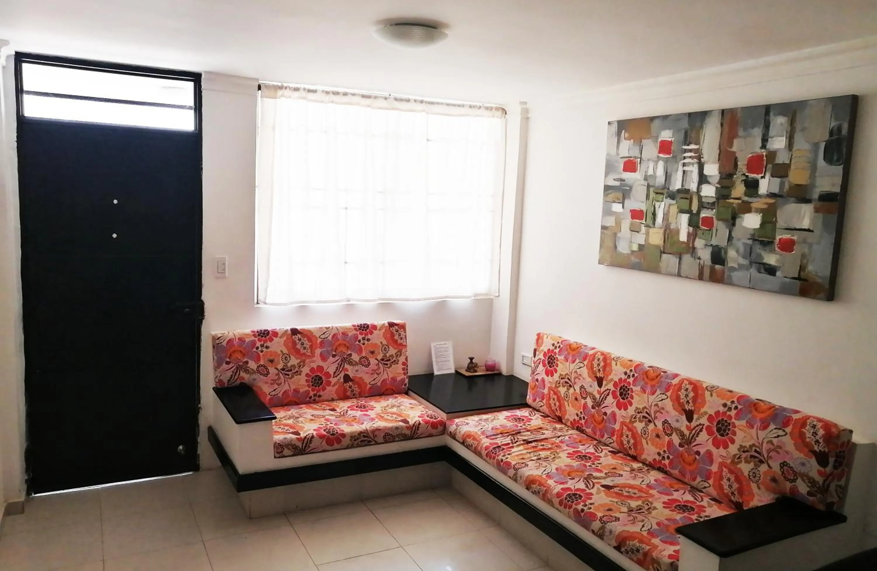 Living room in Las Piloneras Apartahotel