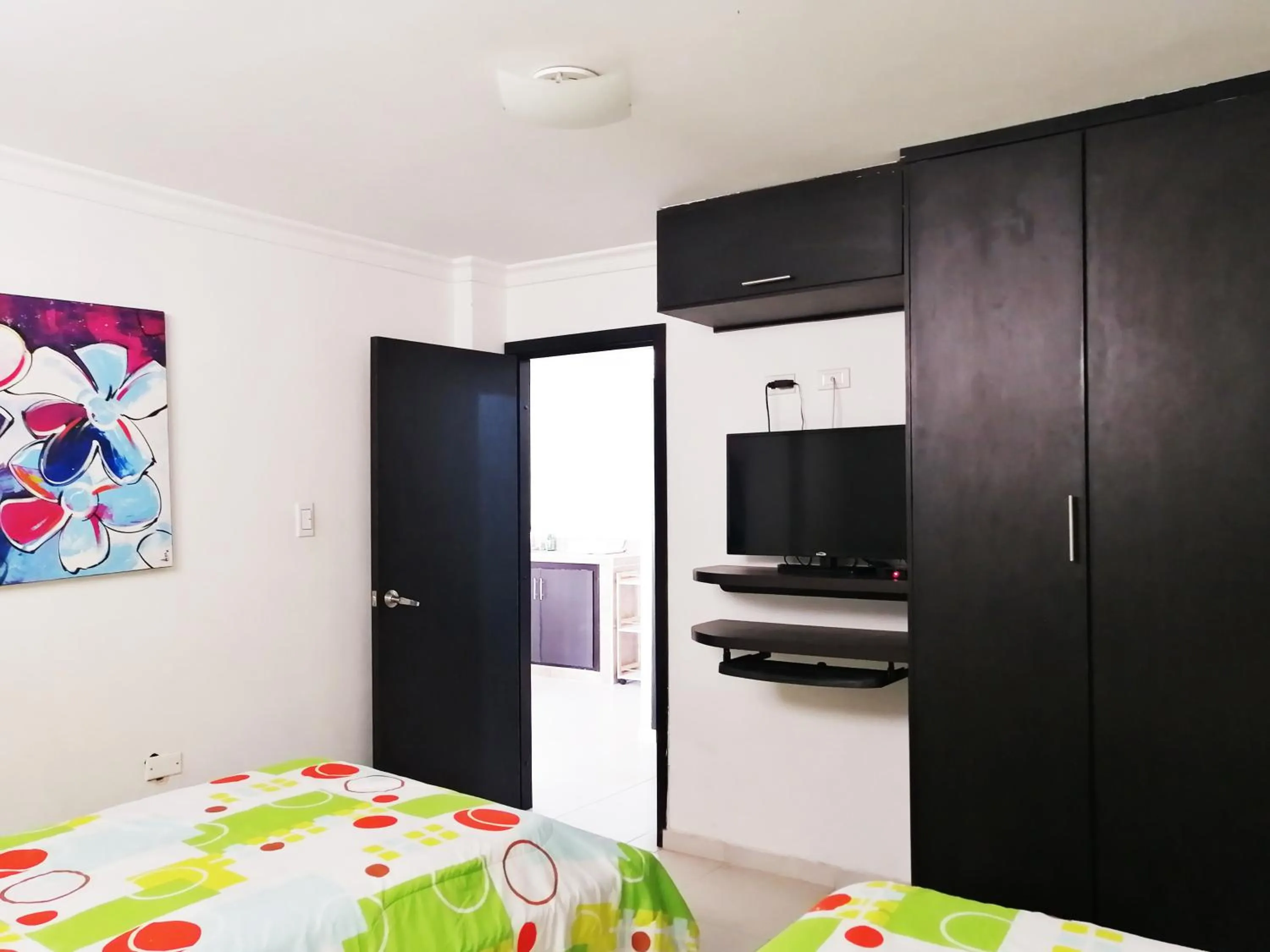 Bed in Las Piloneras Apartahotel