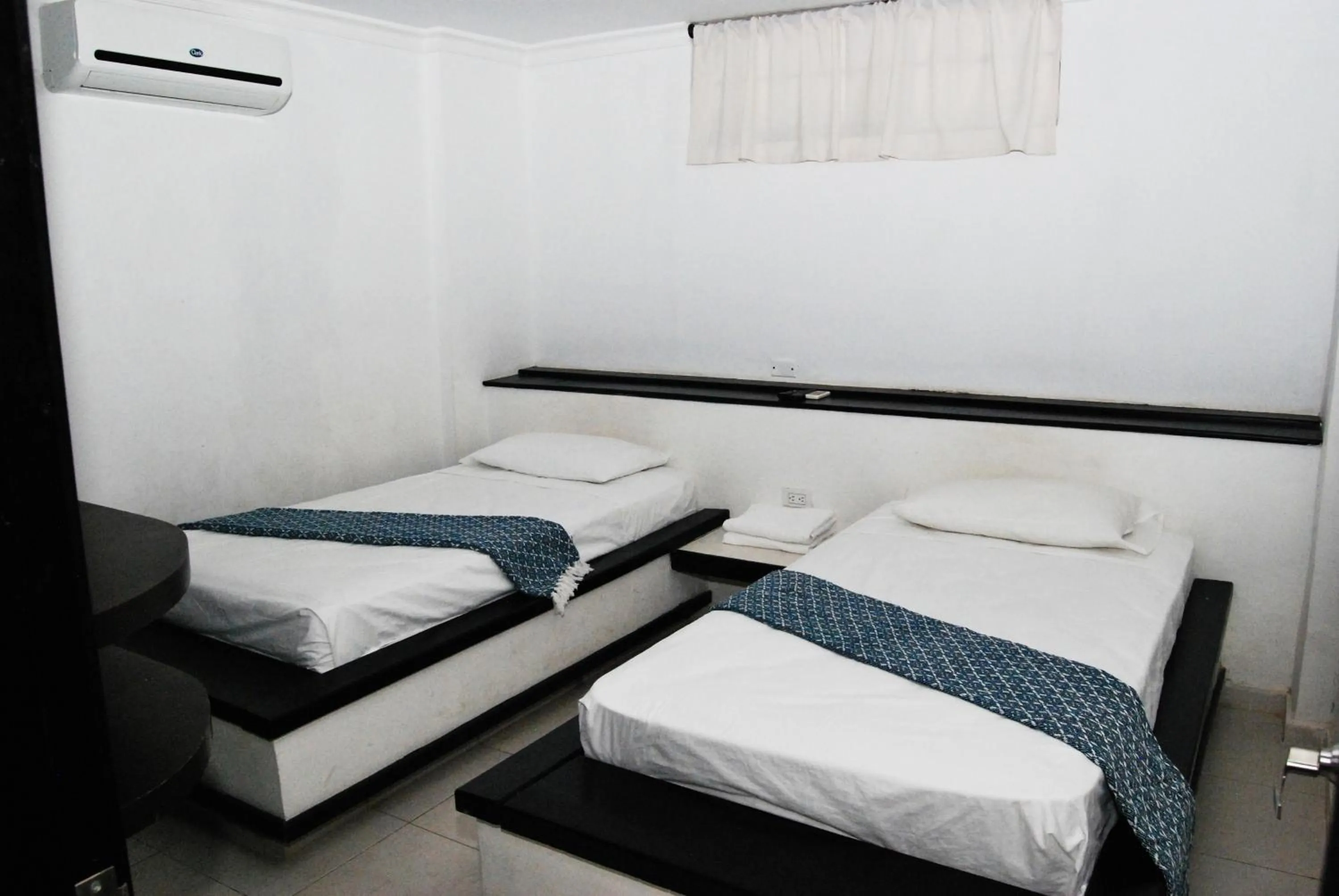 Bed in Las Piloneras Apartahotel