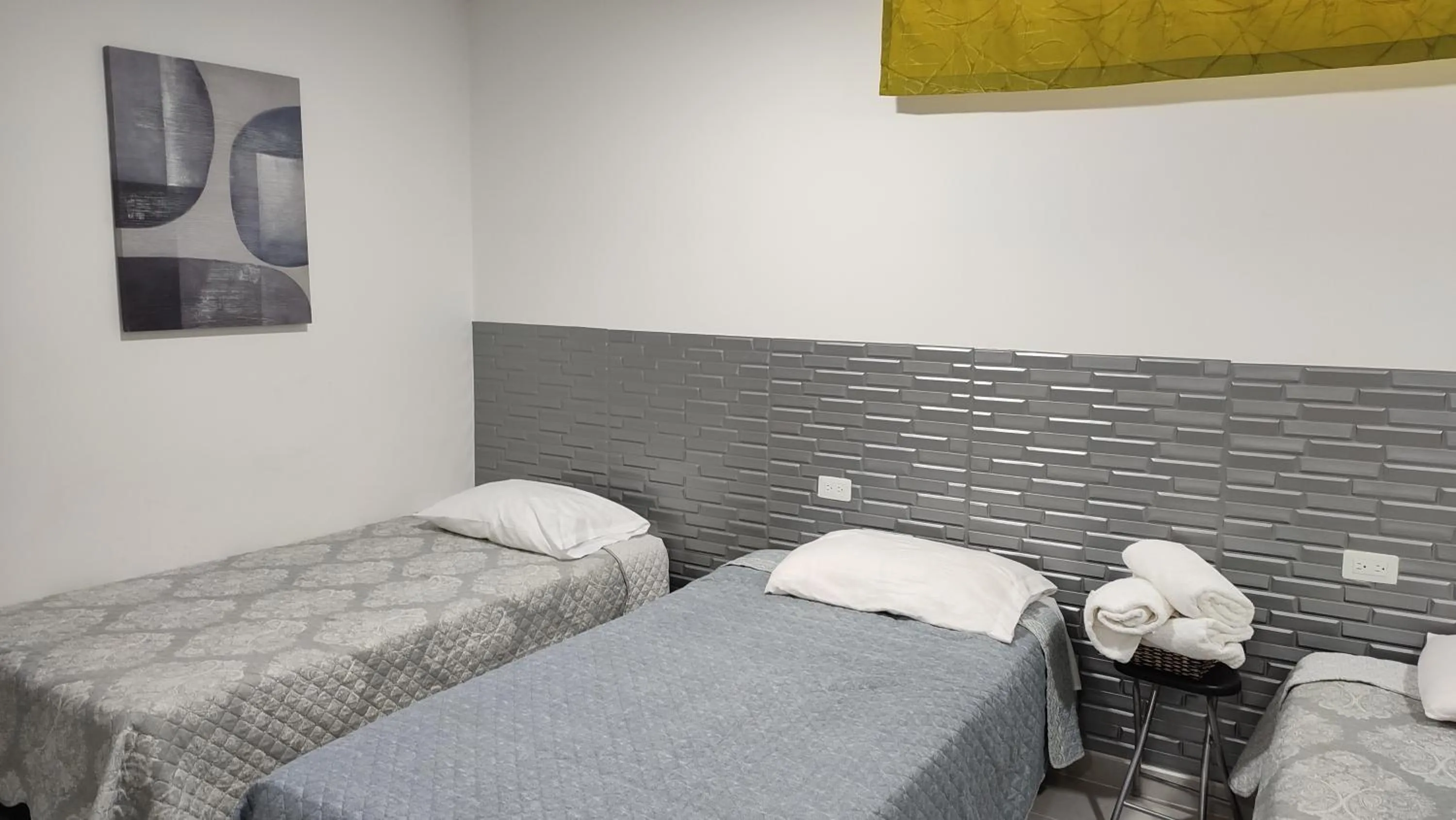 Bed in Las Piloneras Apartahotel