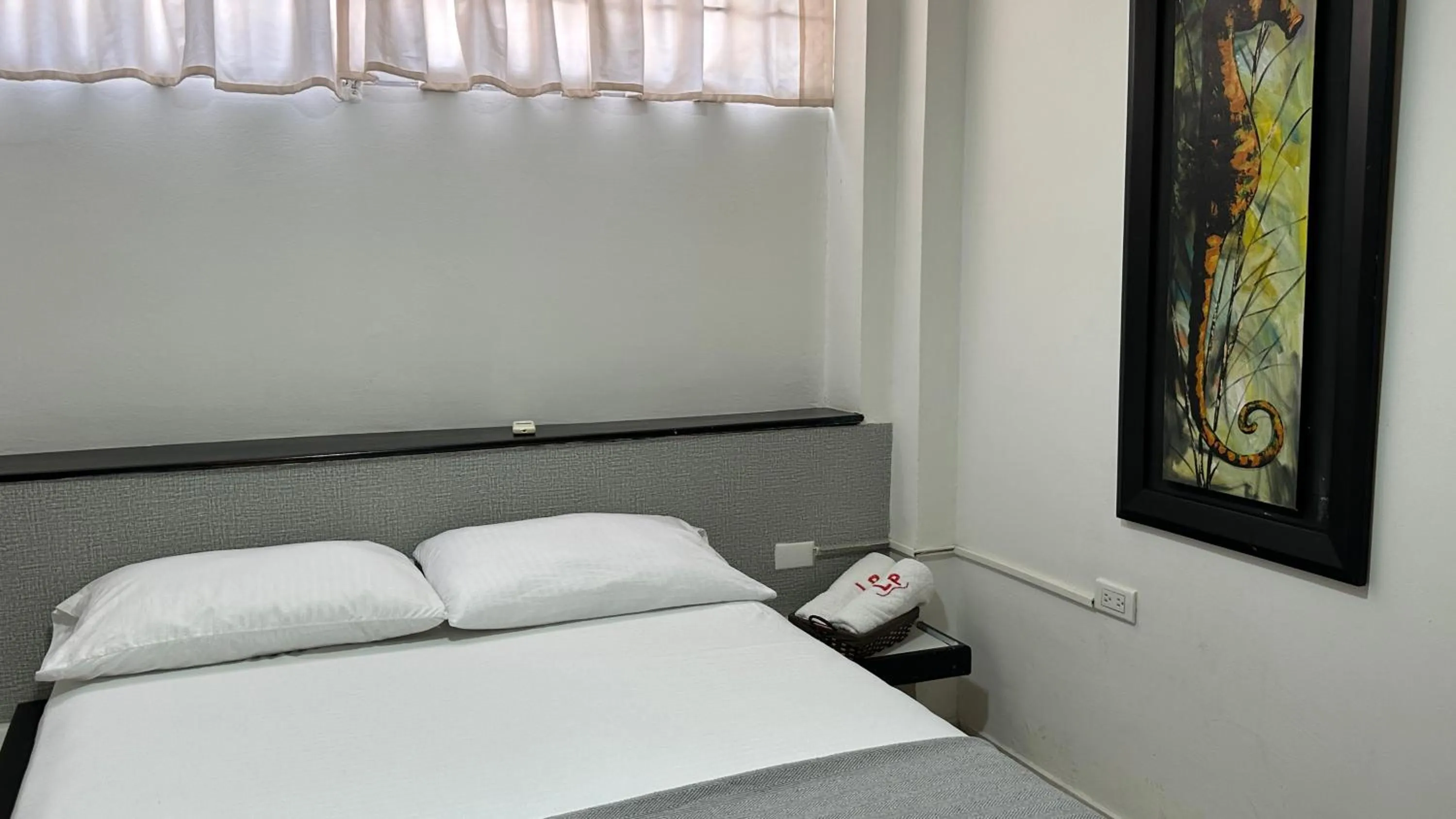 Bed in Las Piloneras Apartahotel