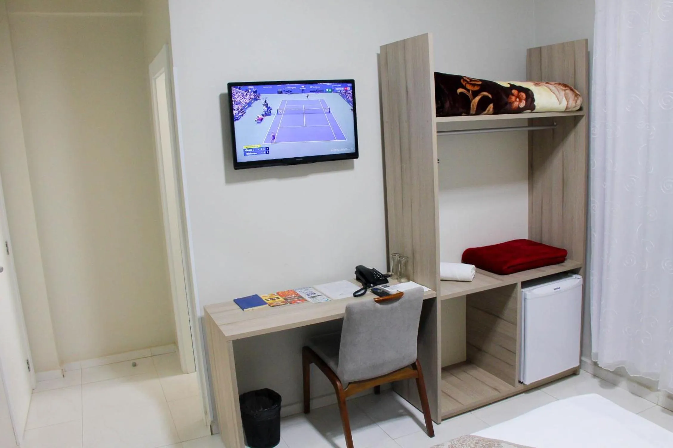 TV and multimedia in AJ Hotel Chapecó - Fácil Acesso Pátio Shopping e Rótula da Bandeira