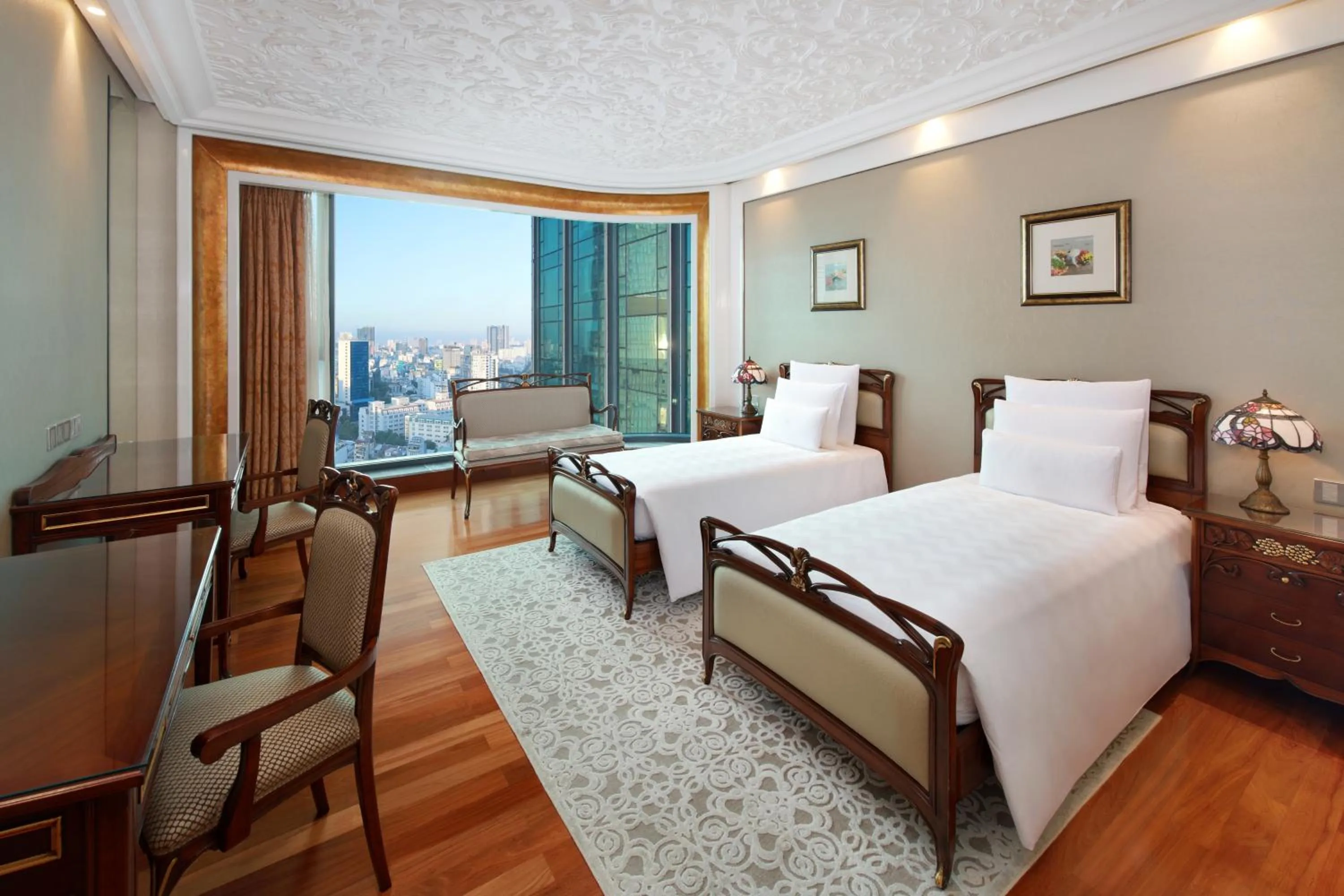 Bed in The Reverie Saigon Residential Suites