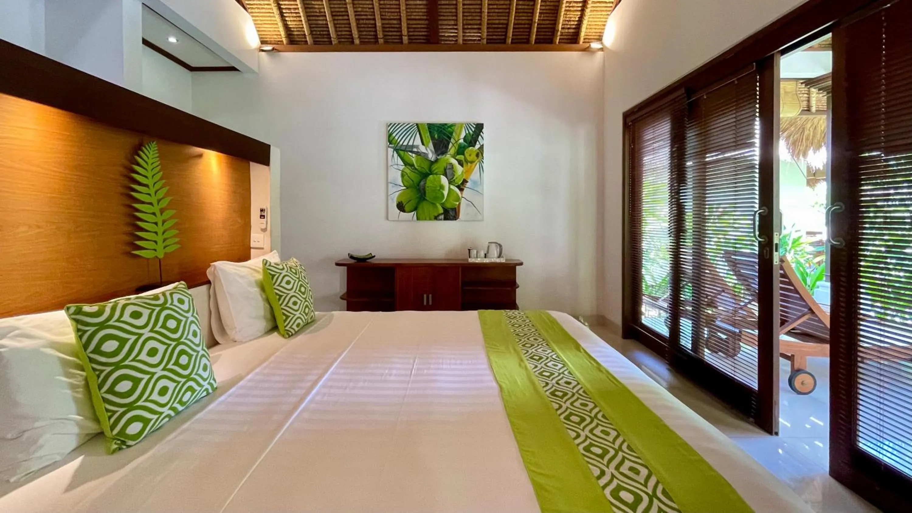 Bed in Palm Garden Amed Beach & Spa Resort Bali