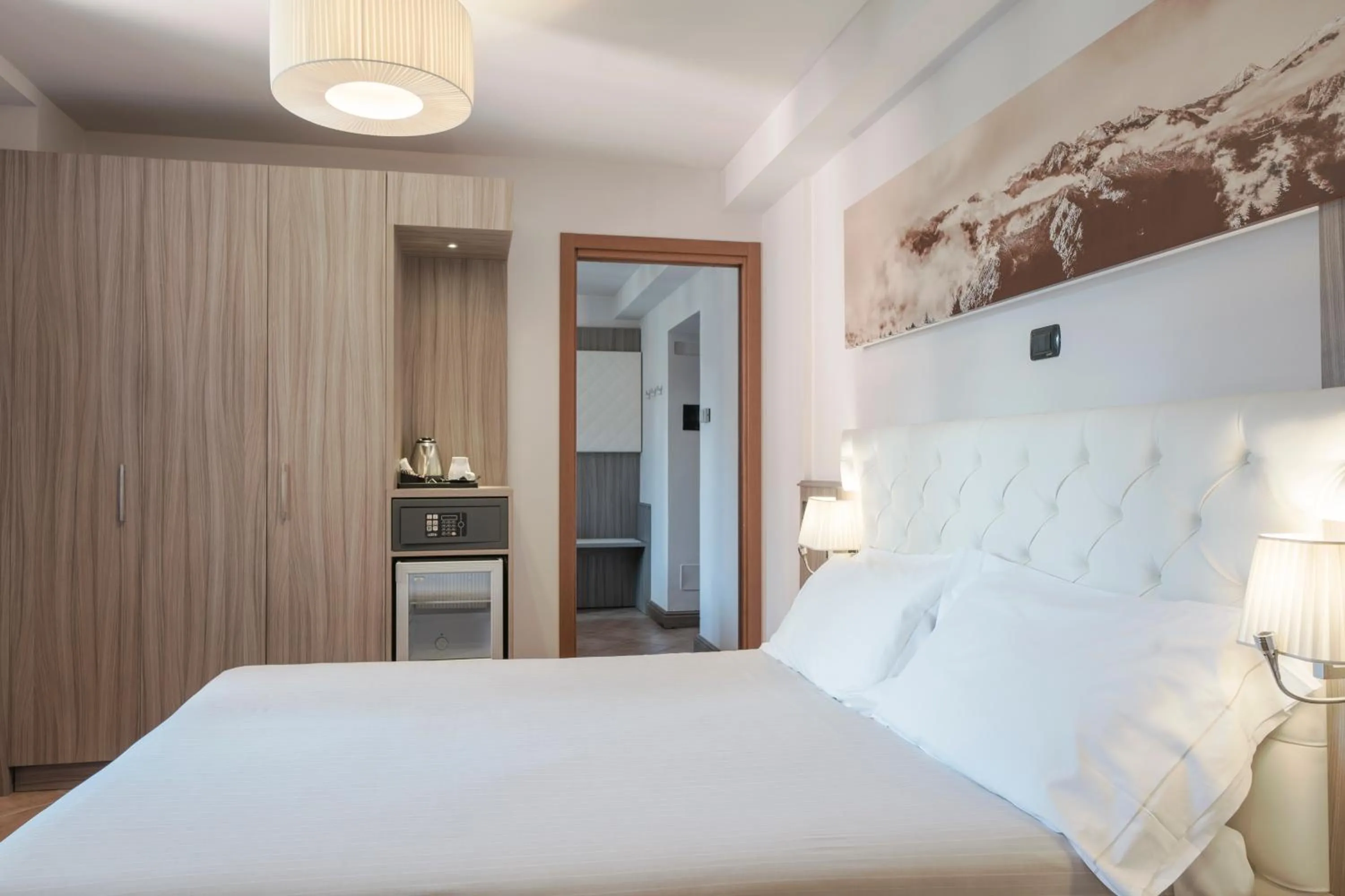 Bed in Hotel Garnì Cristallo