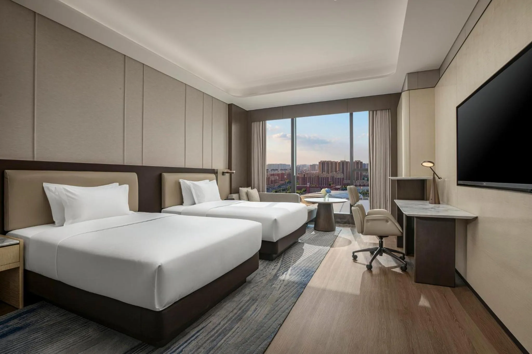 Photo of the whole room, Bed in Crowne Plaza Linyi Olympic Sports Centre by IHG