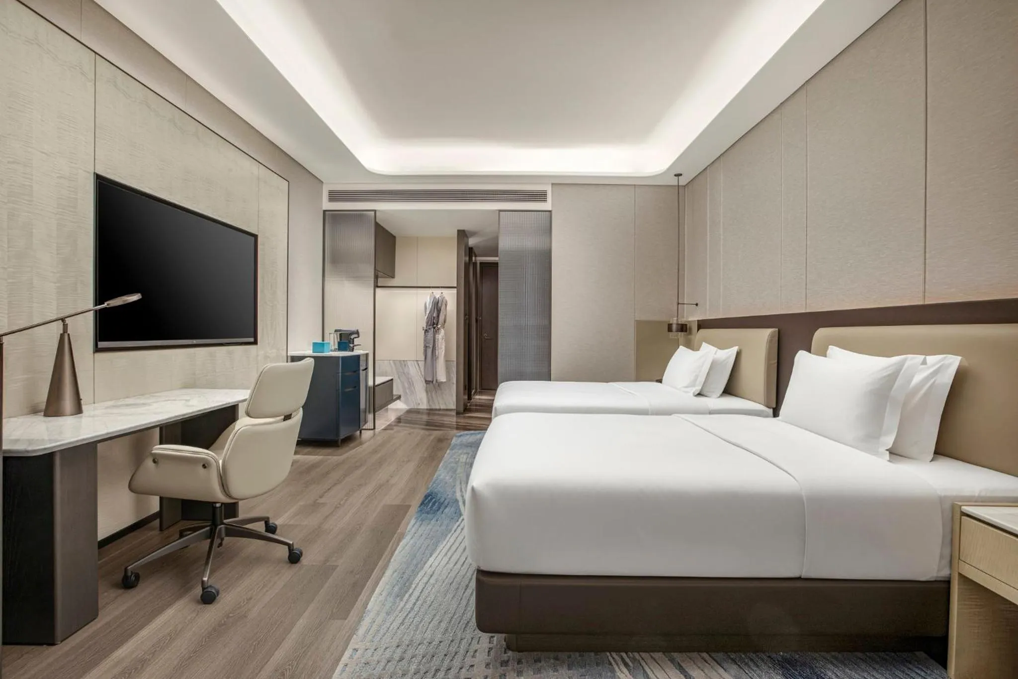 Photo of the whole room, Bed in Crowne Plaza Linyi Olympic Sports Centre by IHG