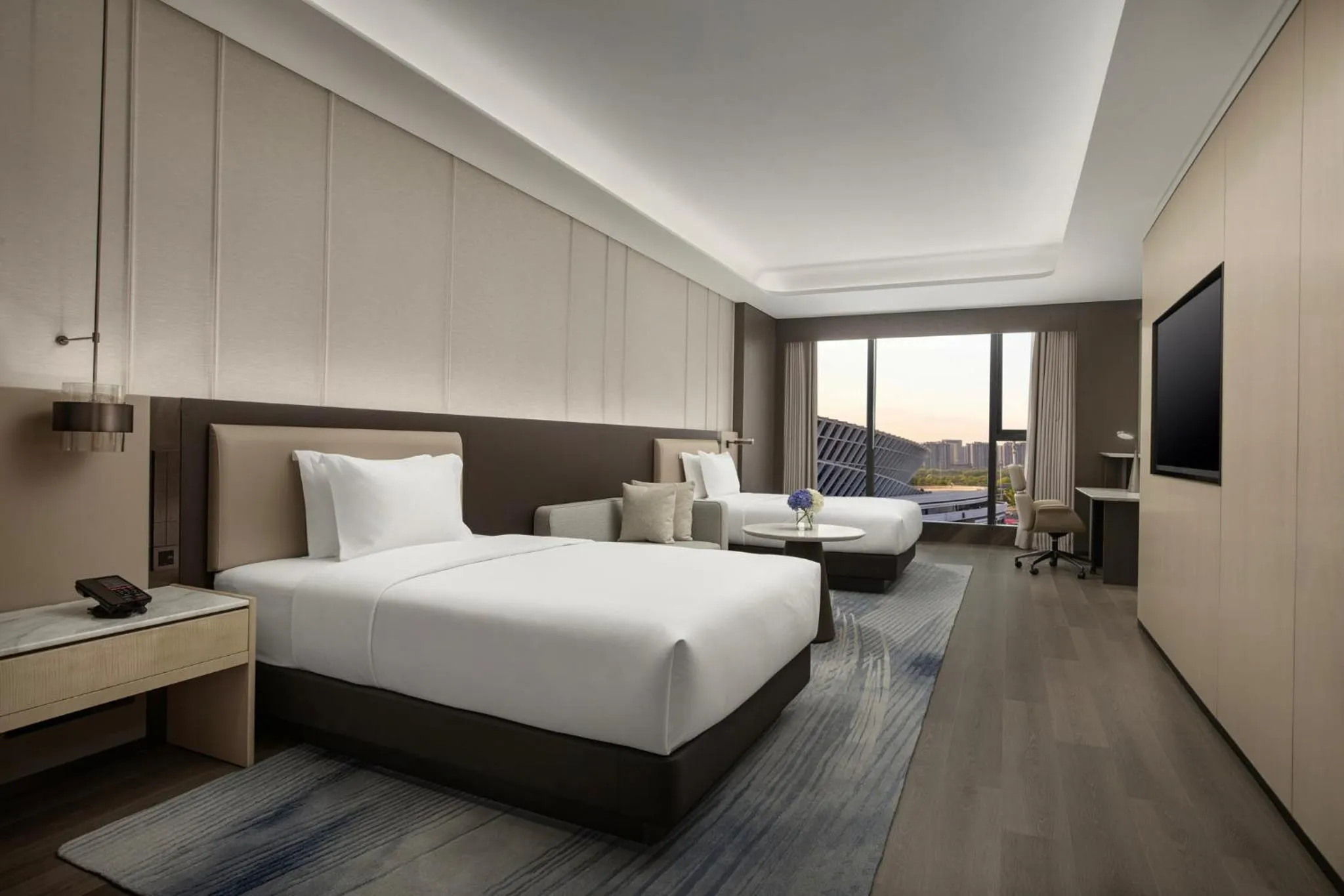 Photo of the whole room, Bed in Crowne Plaza Linyi Olympic Sports Centre by IHG