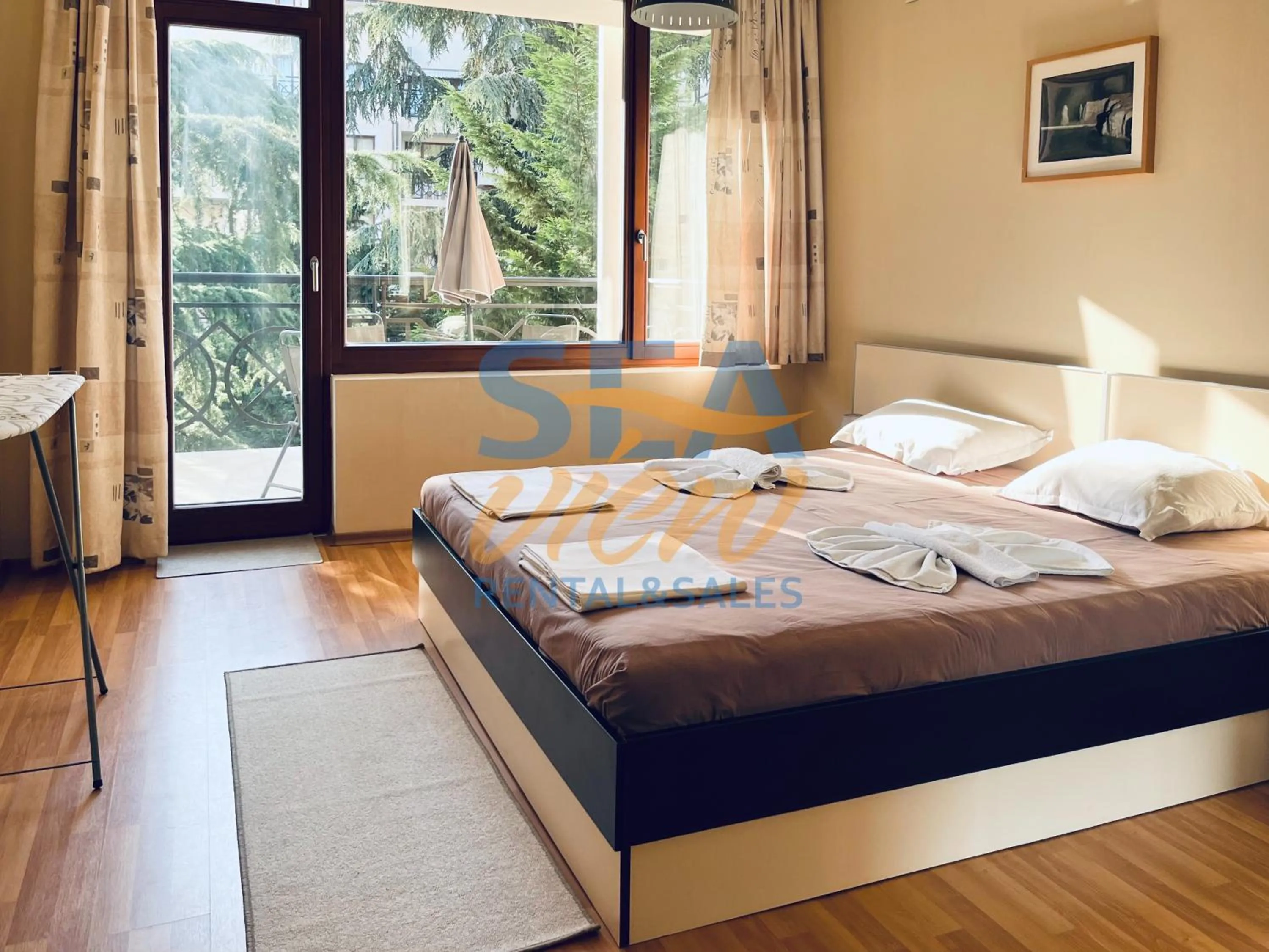 Bed in Sea View Rental Iglika Apartments