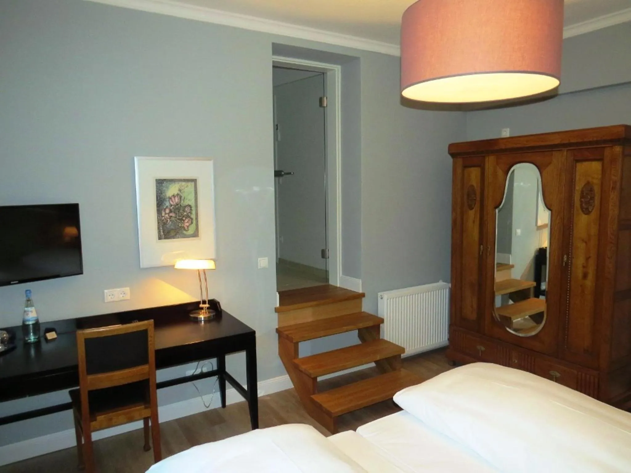 Photo of the whole room, Bed in Villa Waldfrieden - Design trifft Budget