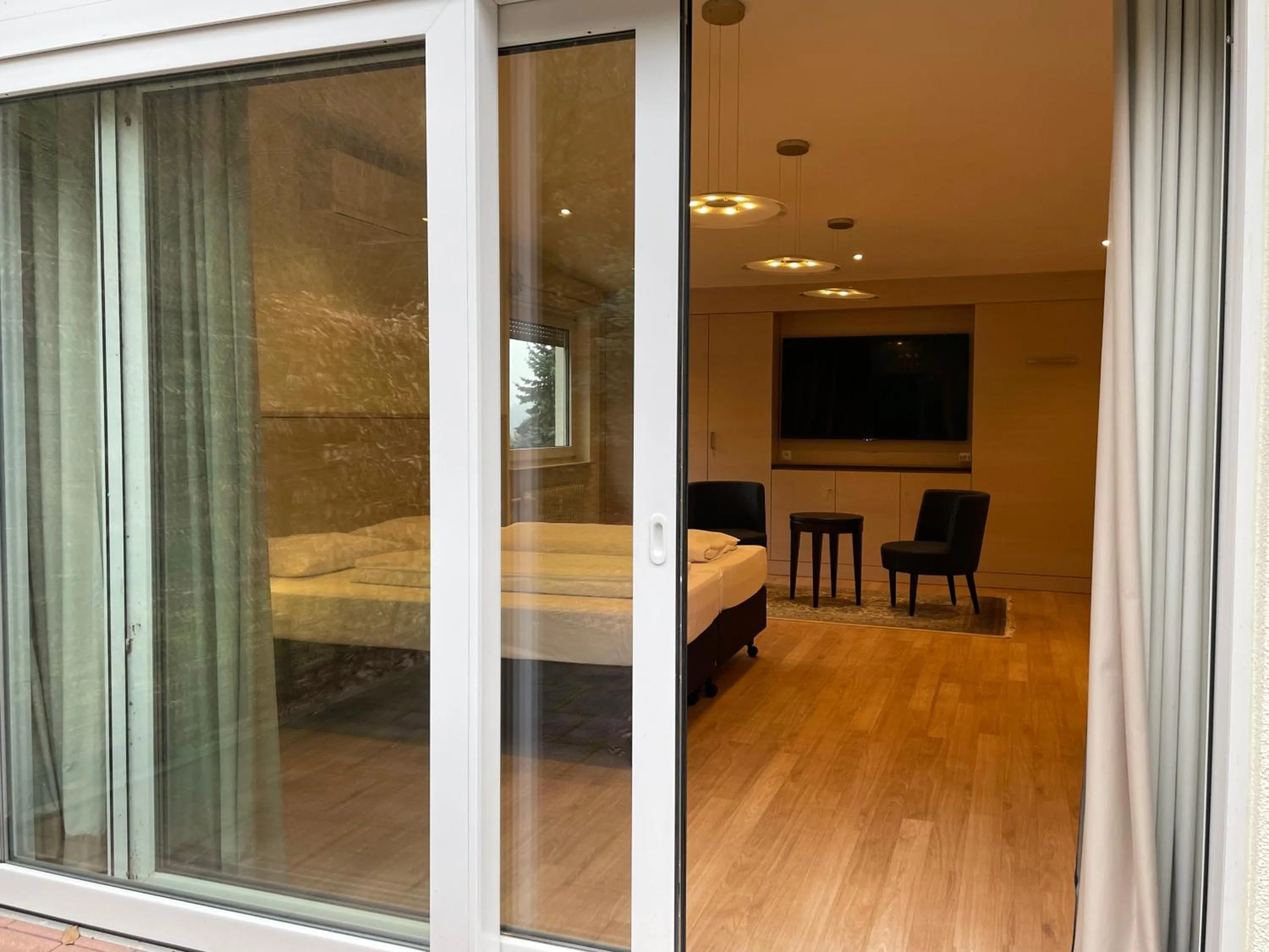 Photo of the whole room, Bed in Villa Waldfrieden - Design trifft Budget