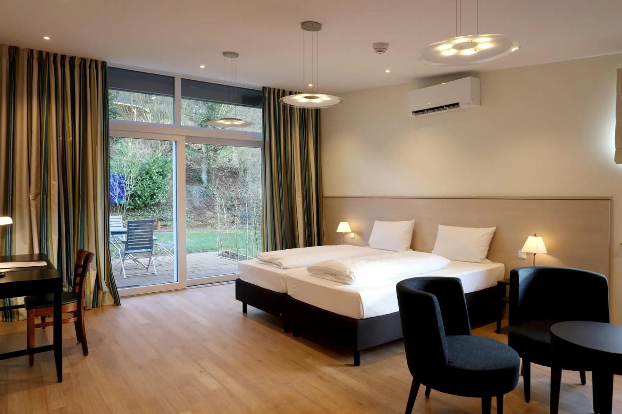 Seating area, Bed in Villa Waldfrieden - Design trifft Budget