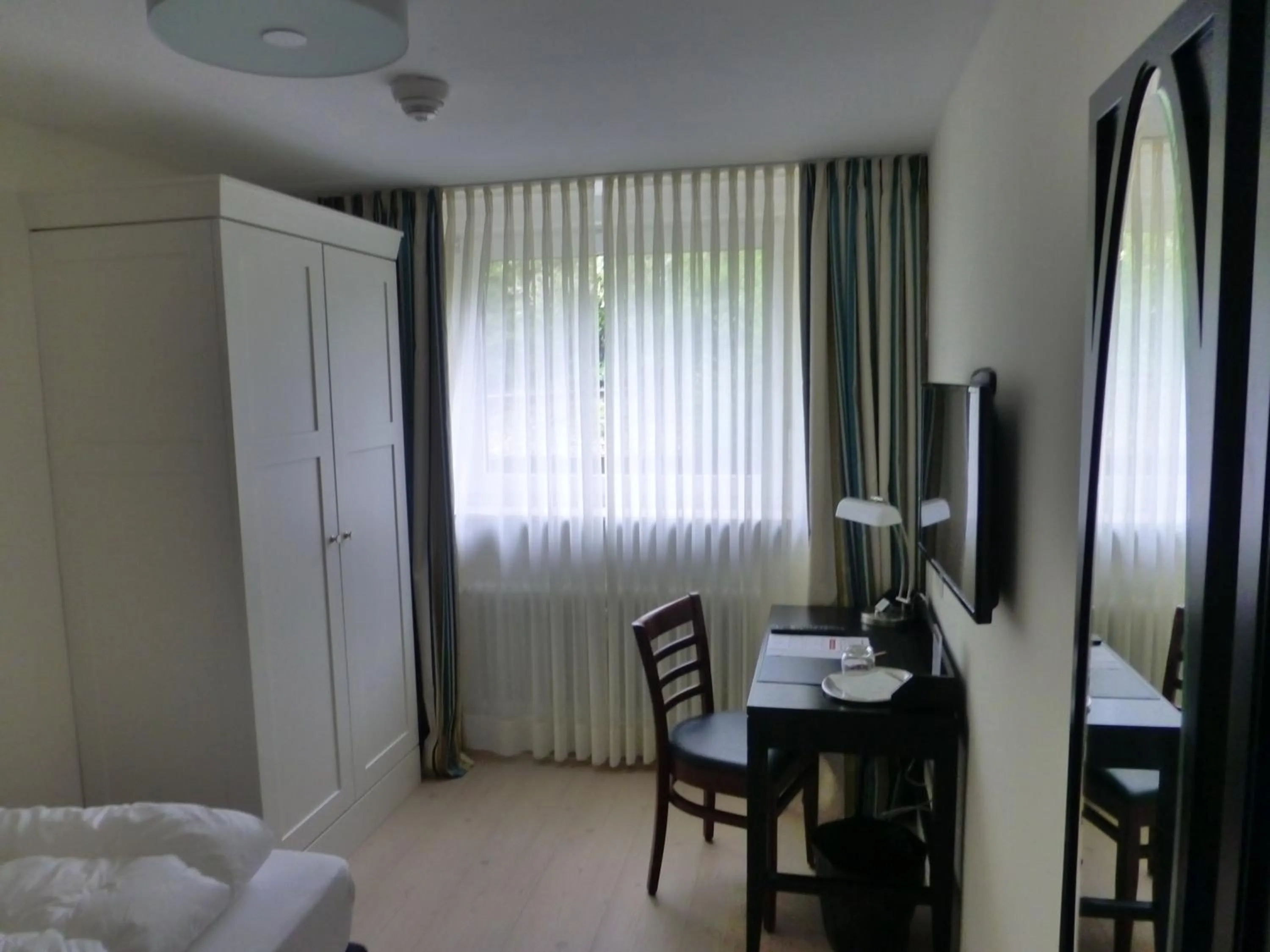 Photo of the whole room, Bed in Villa Waldfrieden - Design trifft Budget