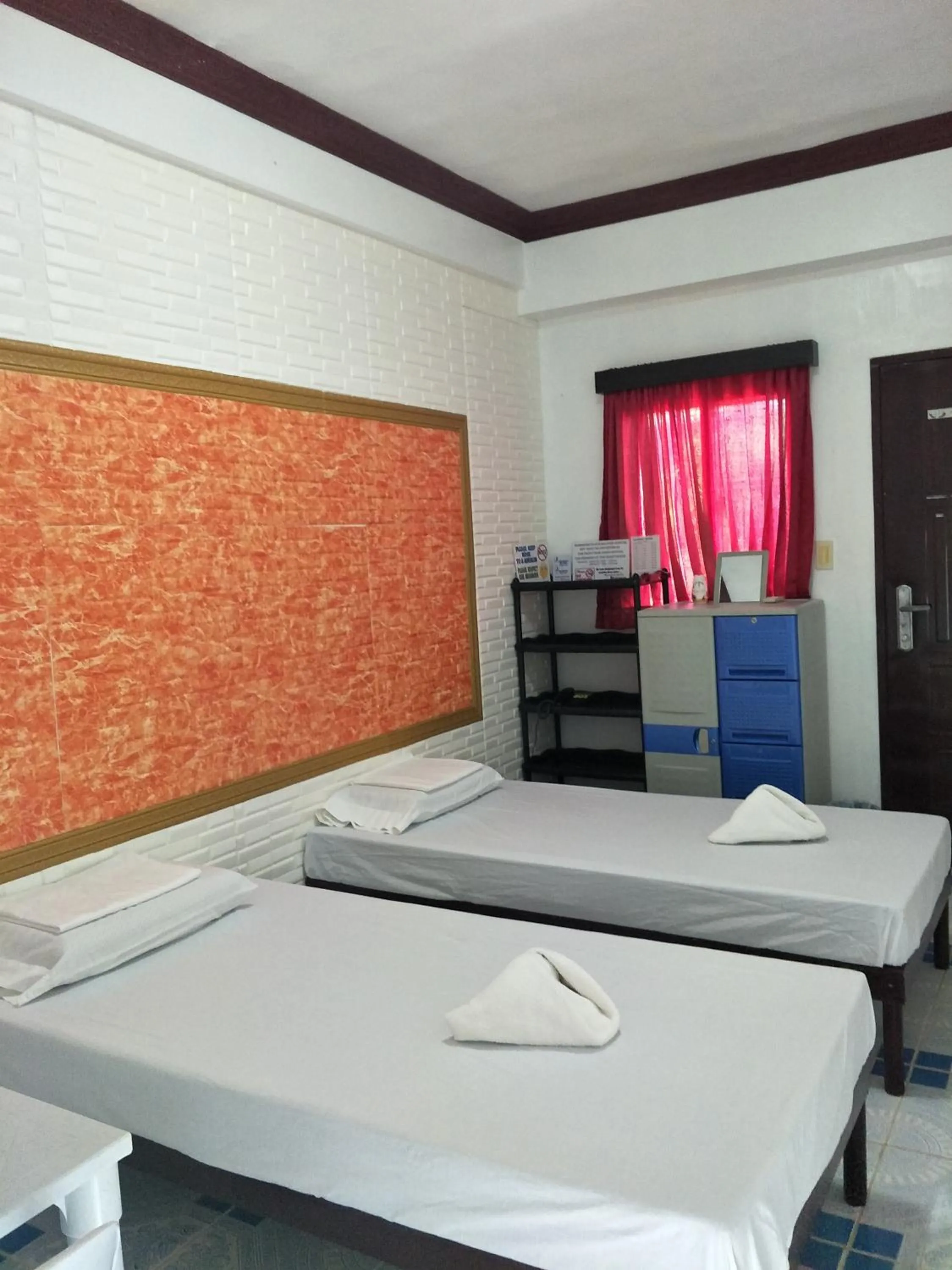 Bed in First Baby Bytes Guest House