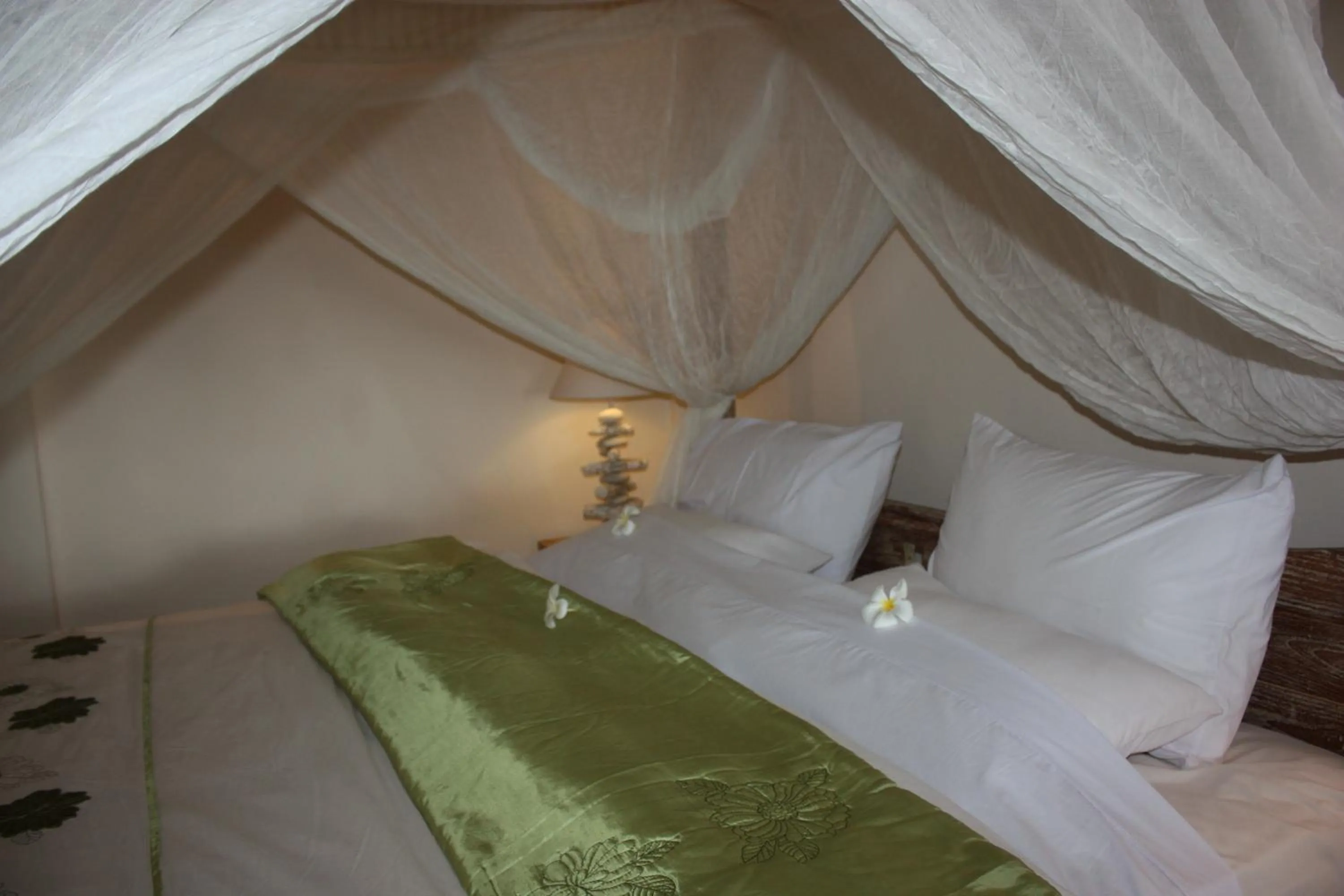 Bed in Joglo On The Beach