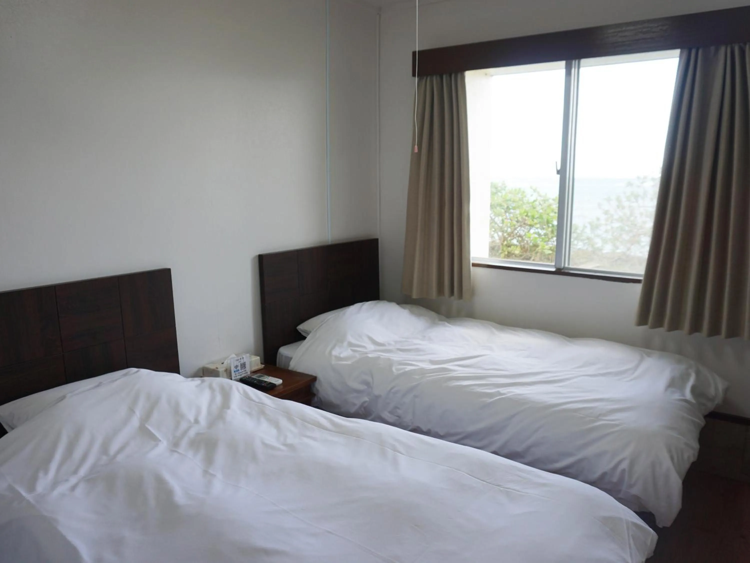 Bed in Hotel Oceans Nakijin