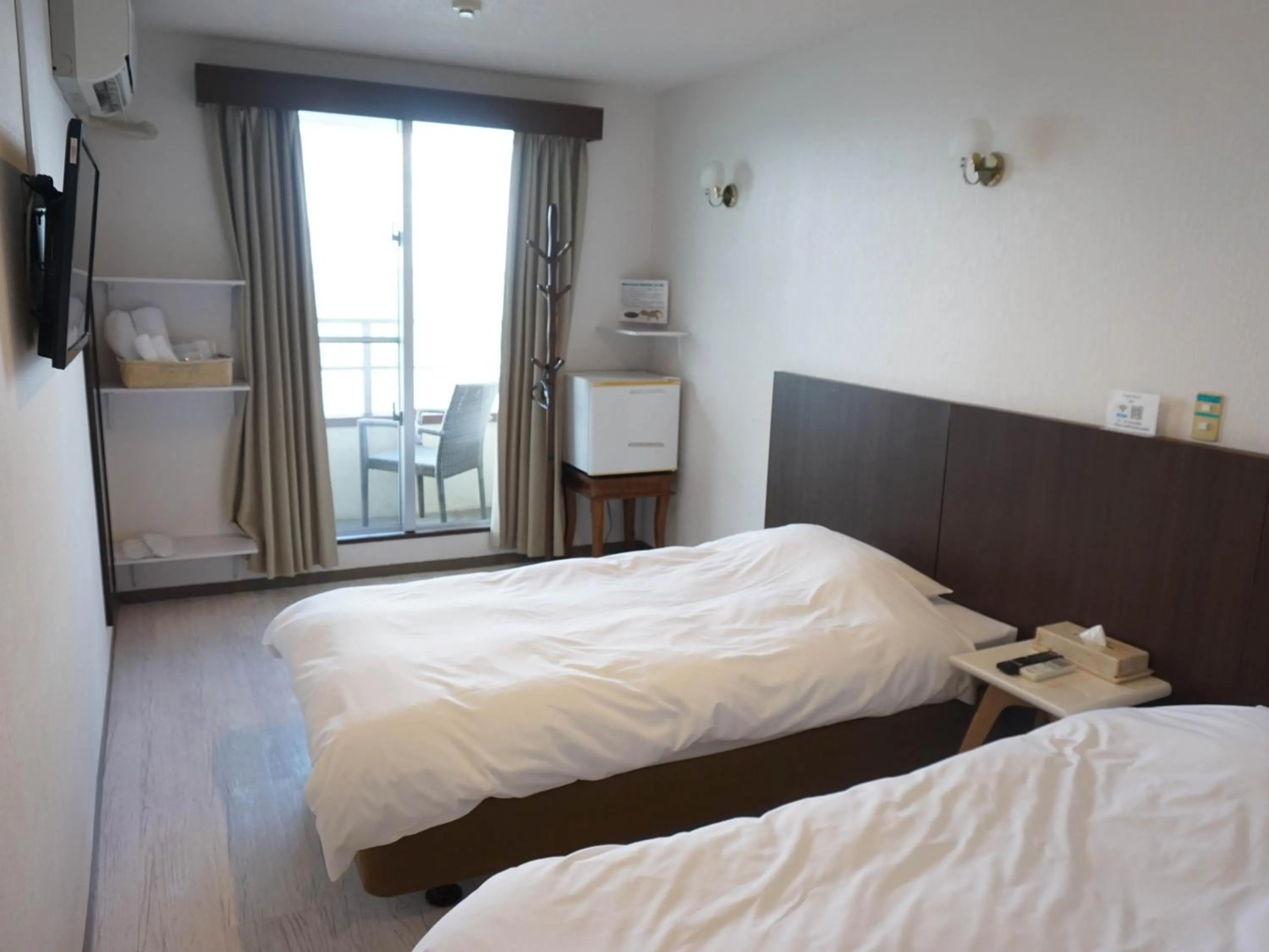 Photo of the whole room, Bed in Hotel Oceans Nakijin