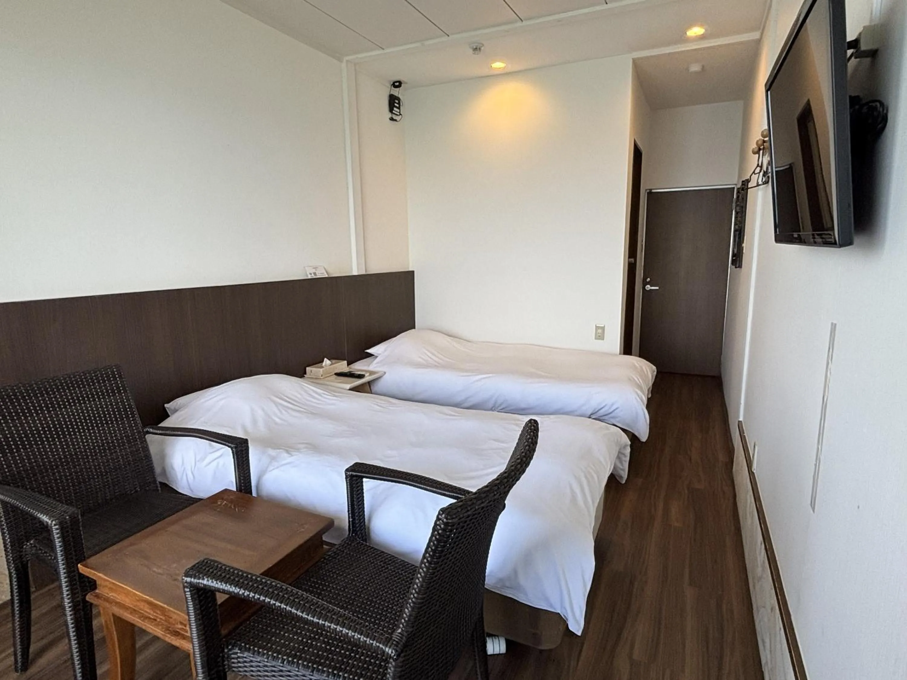 Photo of the whole room, Bed in Hotel Oceans Nakijin