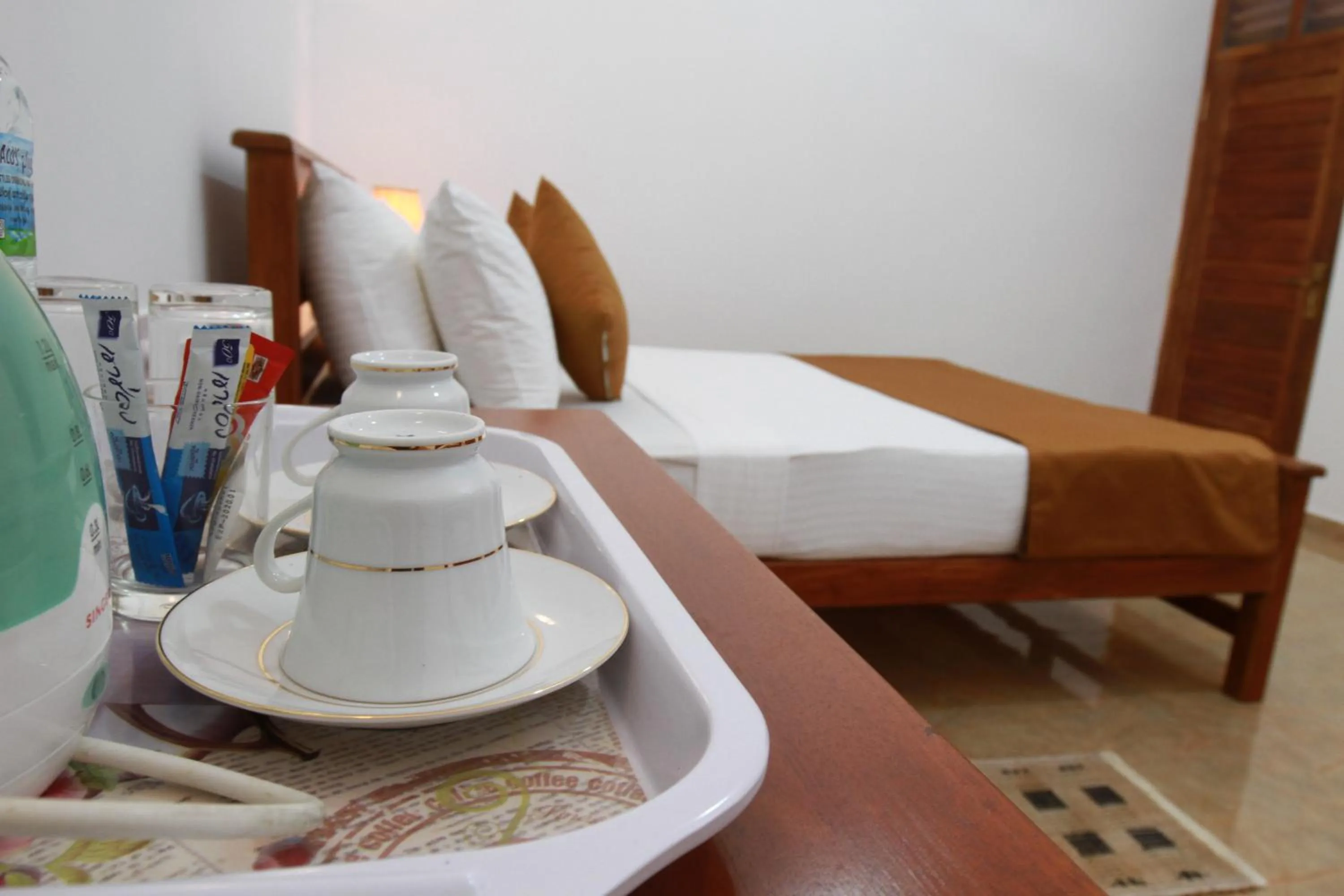 Coffee/tea facilities, Bed in Hotel Nilketha Yala Tissamaharama