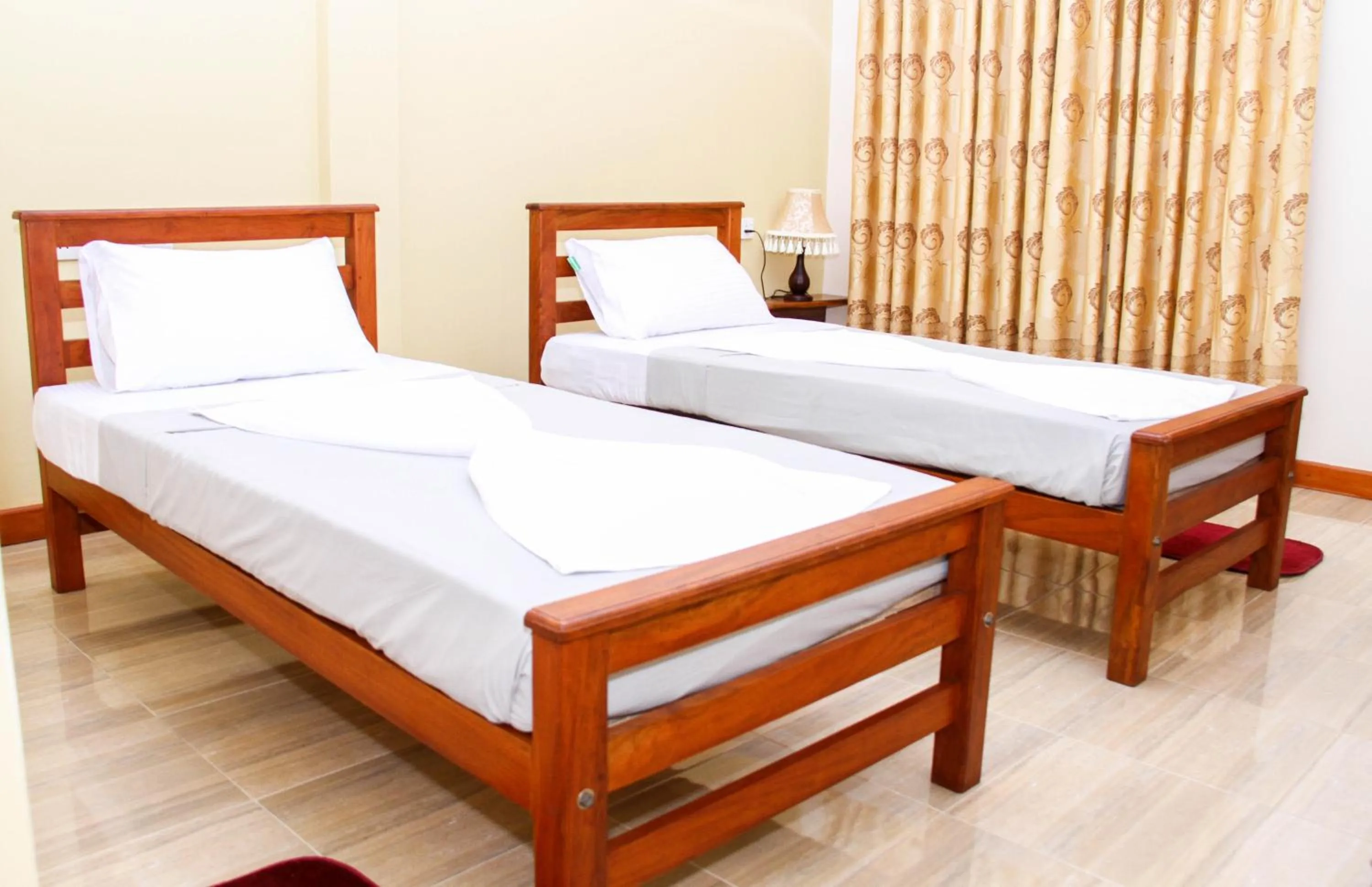 Photo of the whole room, Bed in Hotel Nilketha Yala Tissamaharama