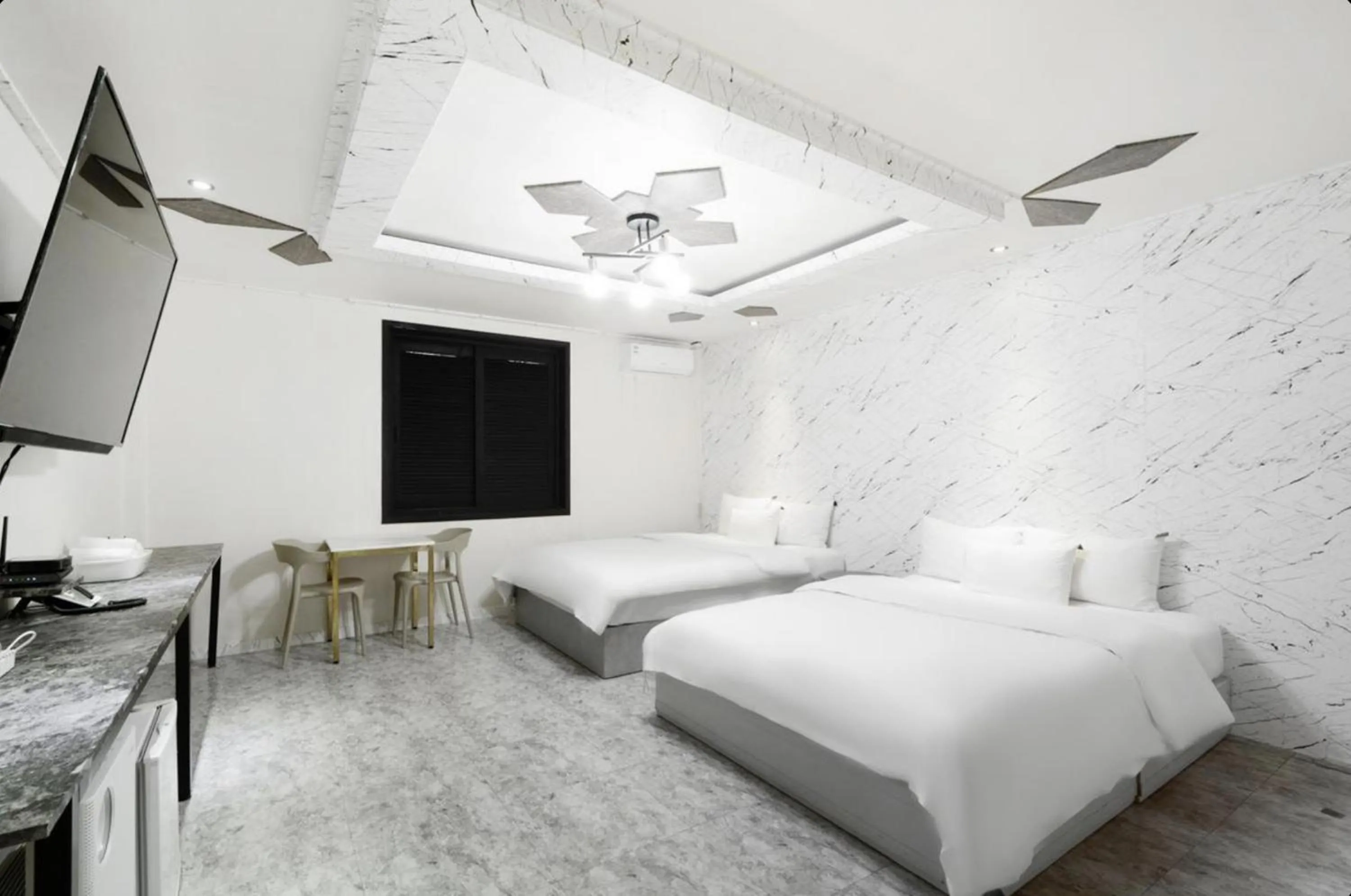 Bed in Gunsan Reborn Hotel