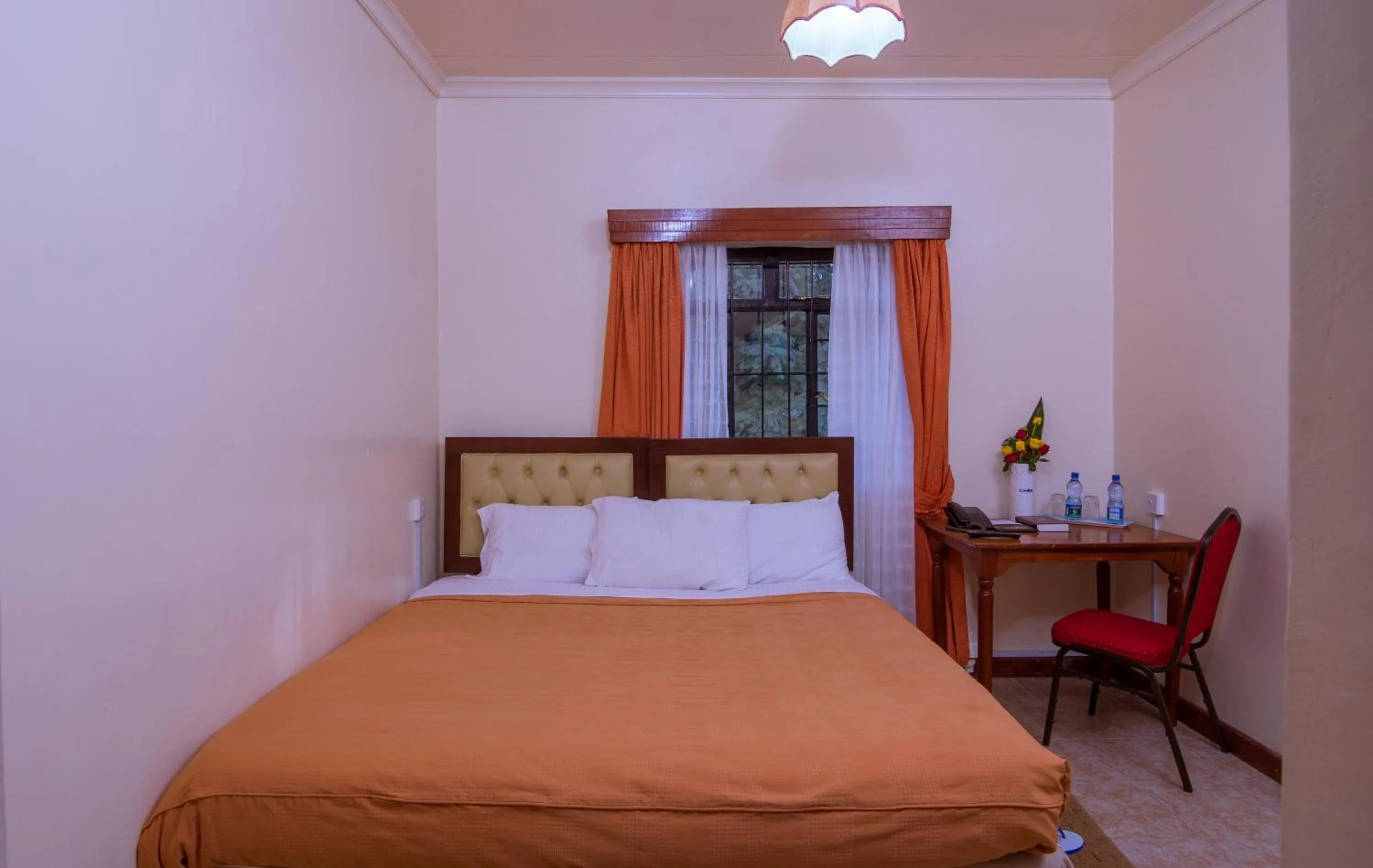 Photo of the whole room, Bed in Chak Guesthouse & Conference Center