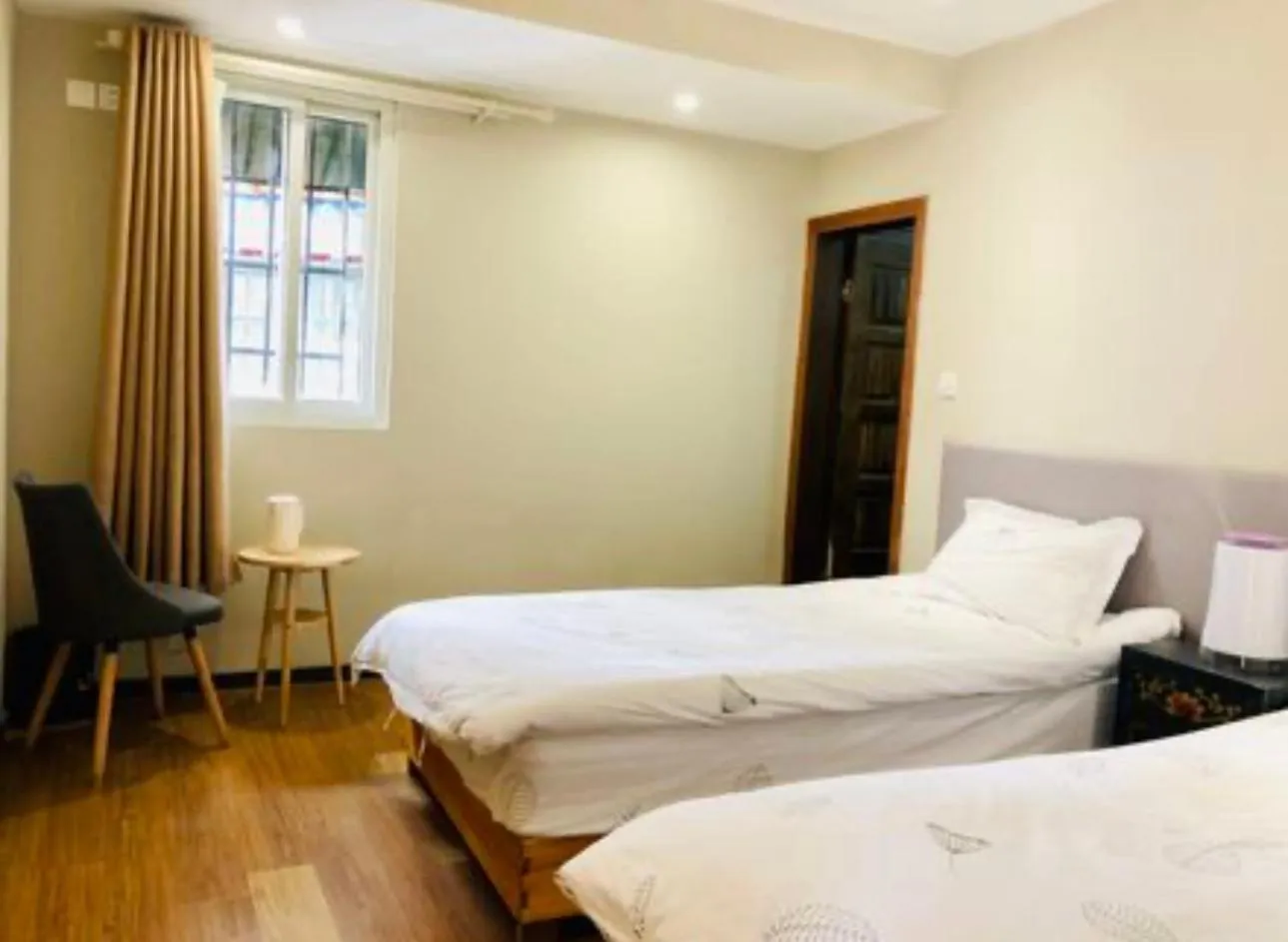 Bed in Fengma Feiyang Hostel