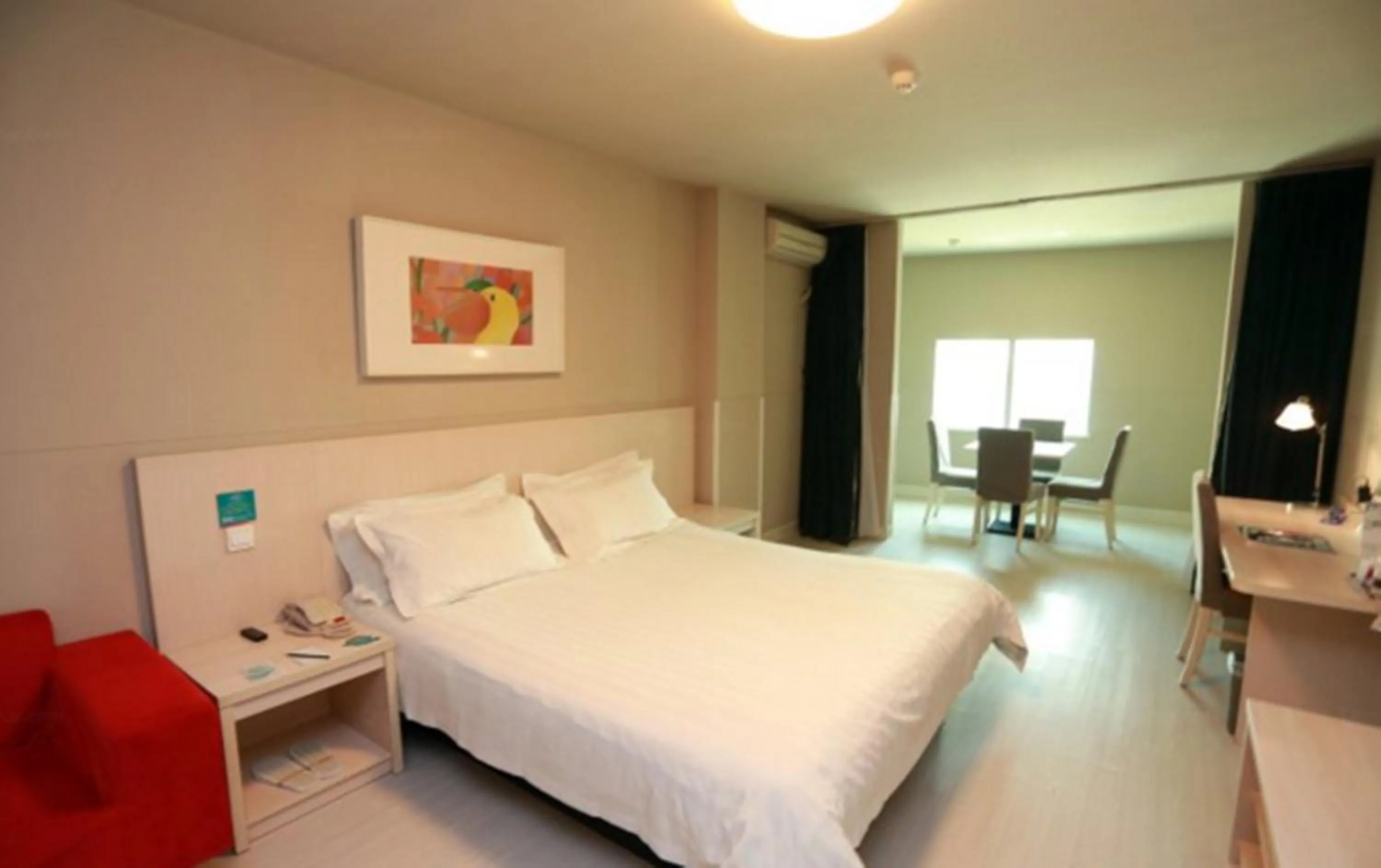 Photo of the whole room, Bed in Jinjiang Inn Wuhan Optical Valley Finance Habour