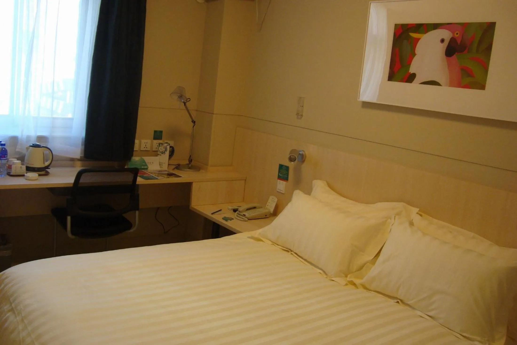 Bed in Jinjiang Inn Wanda Plaza Hotel Taiyuan Street Shenyang