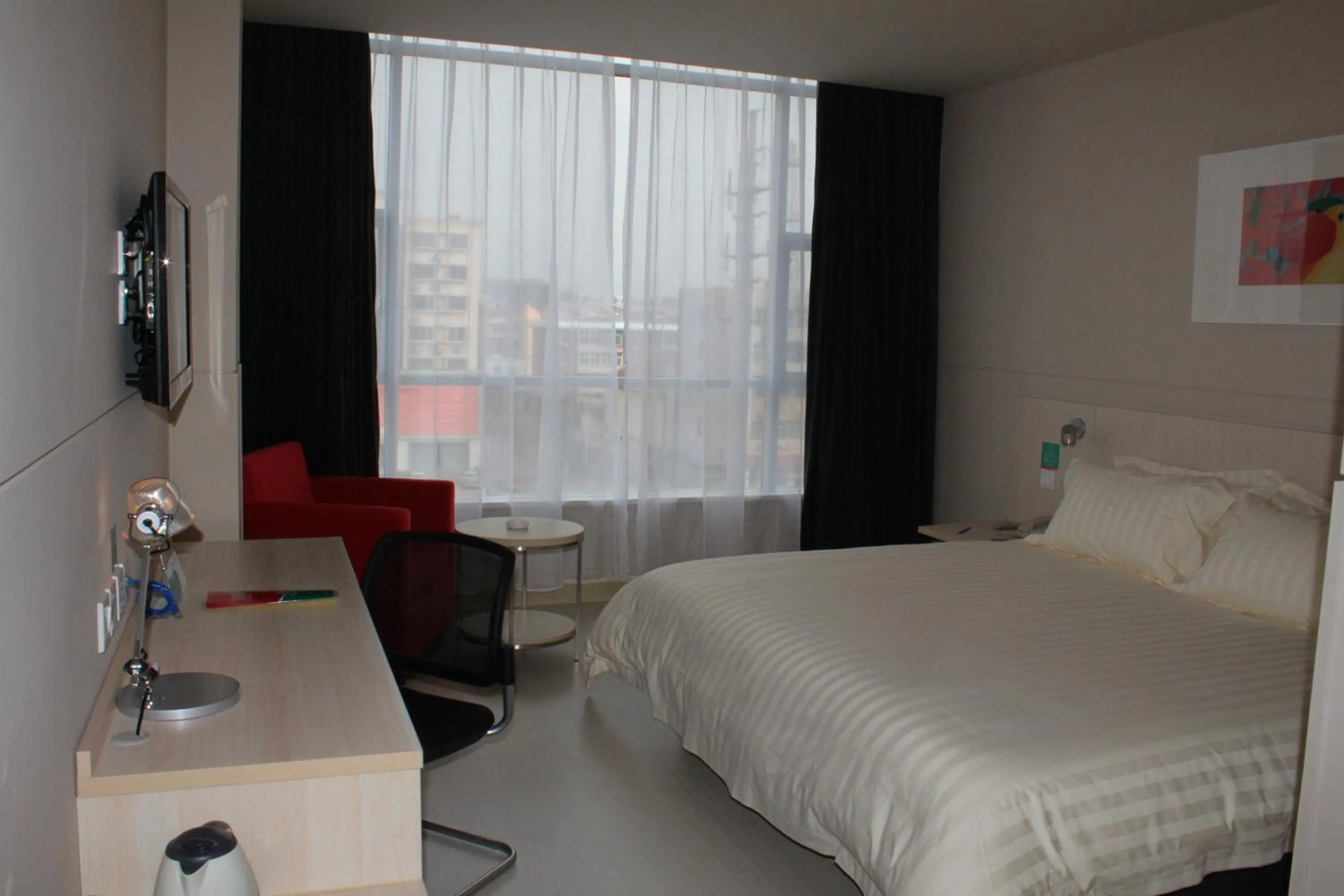 Photo of the whole room, Bed in Jinjiang Inn Jincheng Zhongyuan Street