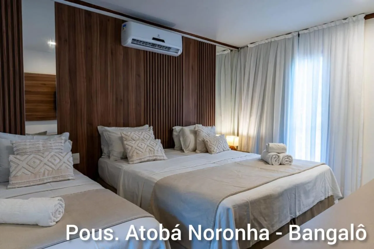 Bed in Pousada Atoba