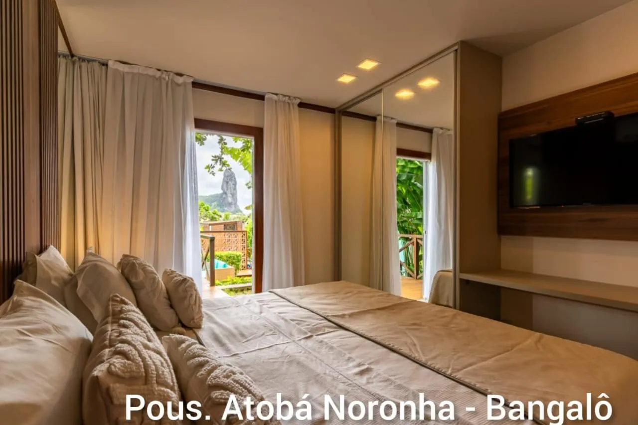 Bed in Pousada Atoba