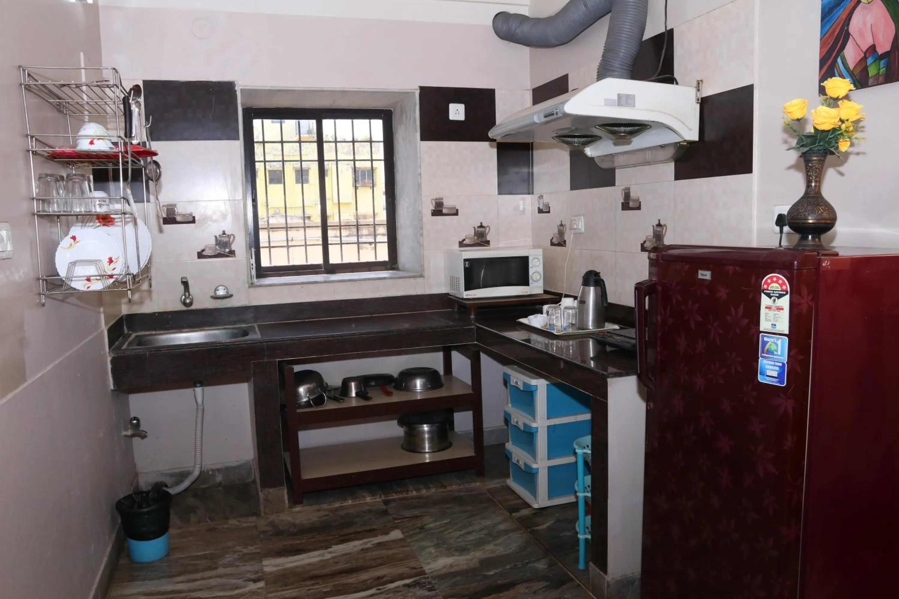 Kitchen or kitchenette in The Elite Apartment Hotel