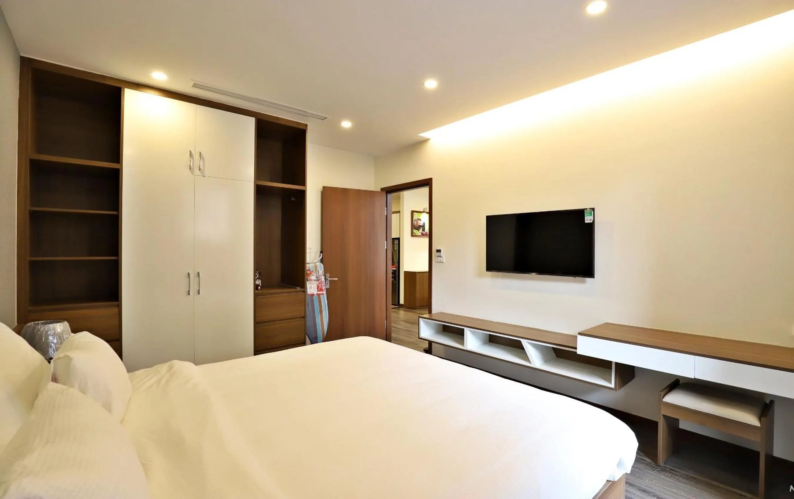 Bed in Luxe Paradise Suites Tay Ho