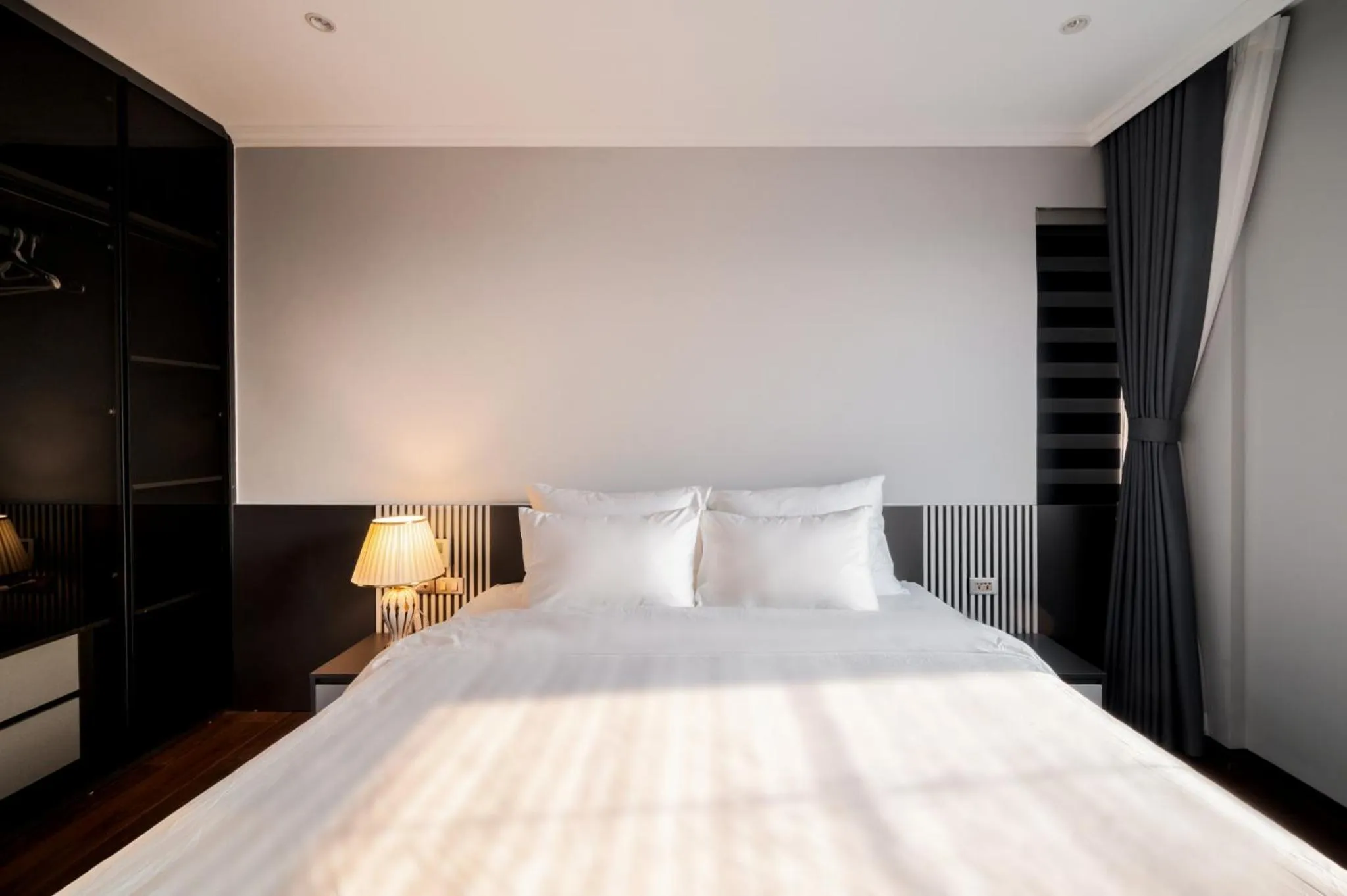 Bed in Luxe Paradise Suites Tay Ho