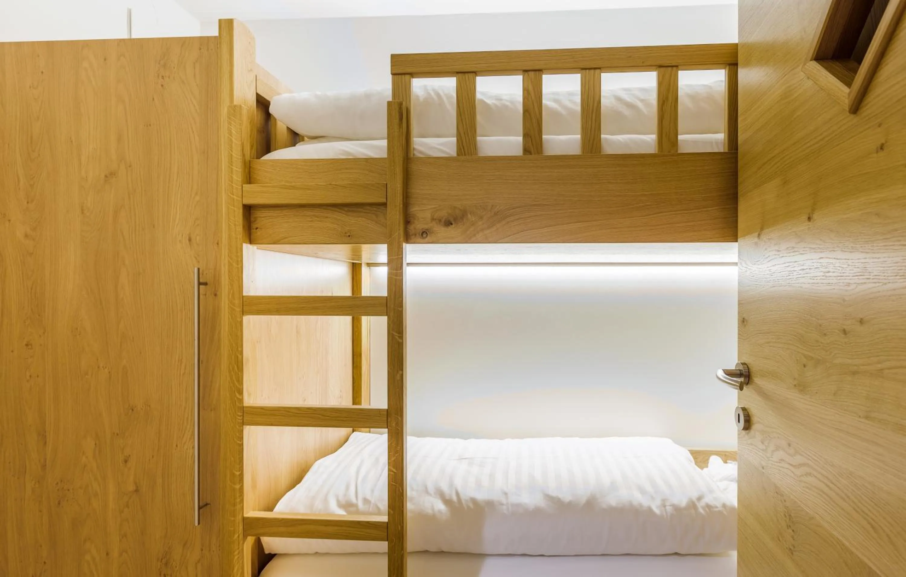 Bedroom, Bed in Bolodges Apartments by Alpin Rentals