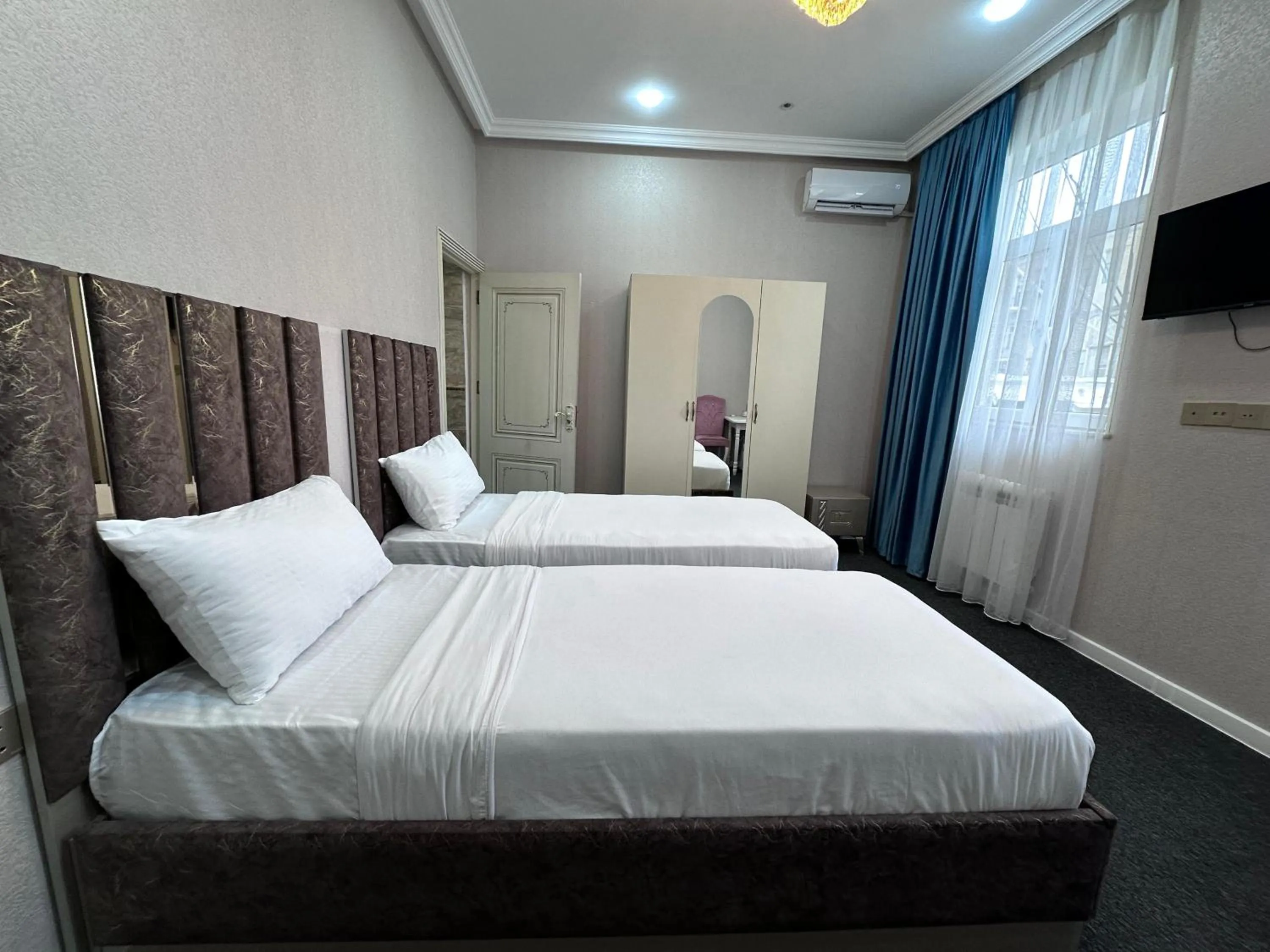 Bed in Central City Hotel