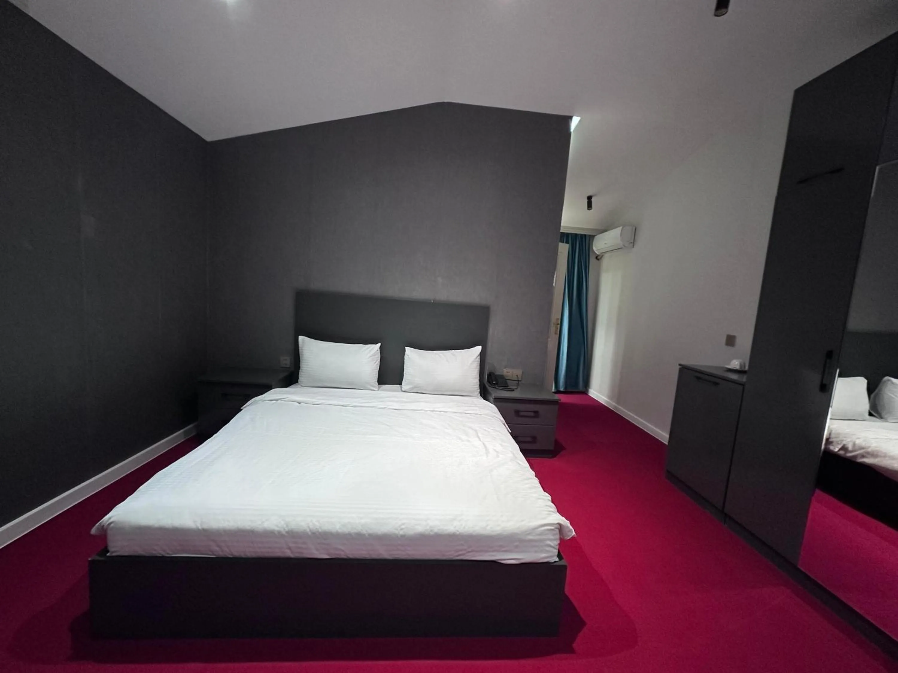 Bed in Central City Hotel