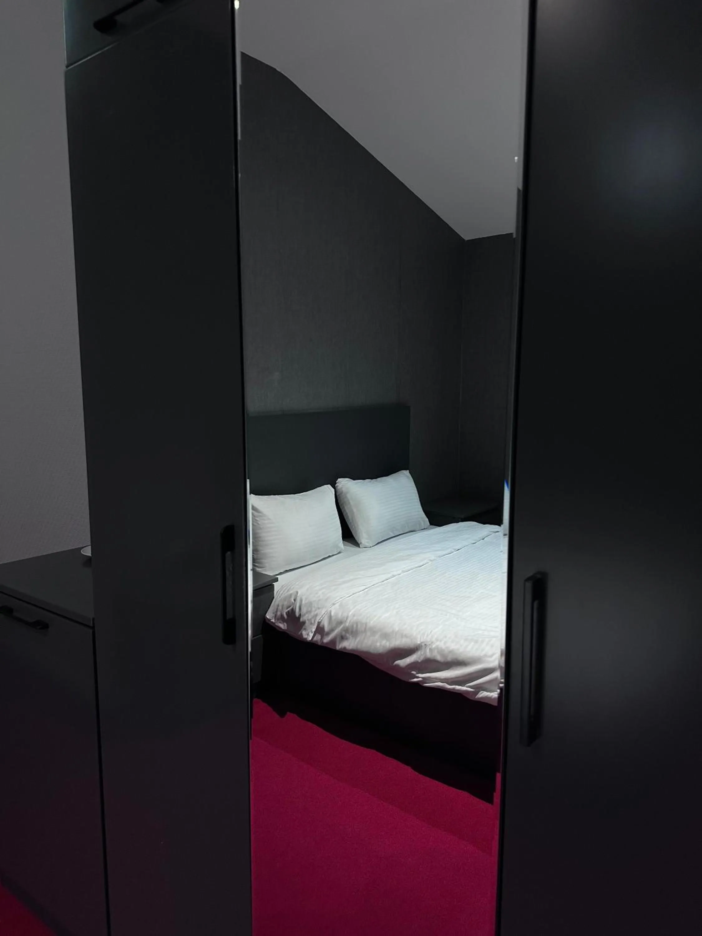 Bed in Central City Hotel