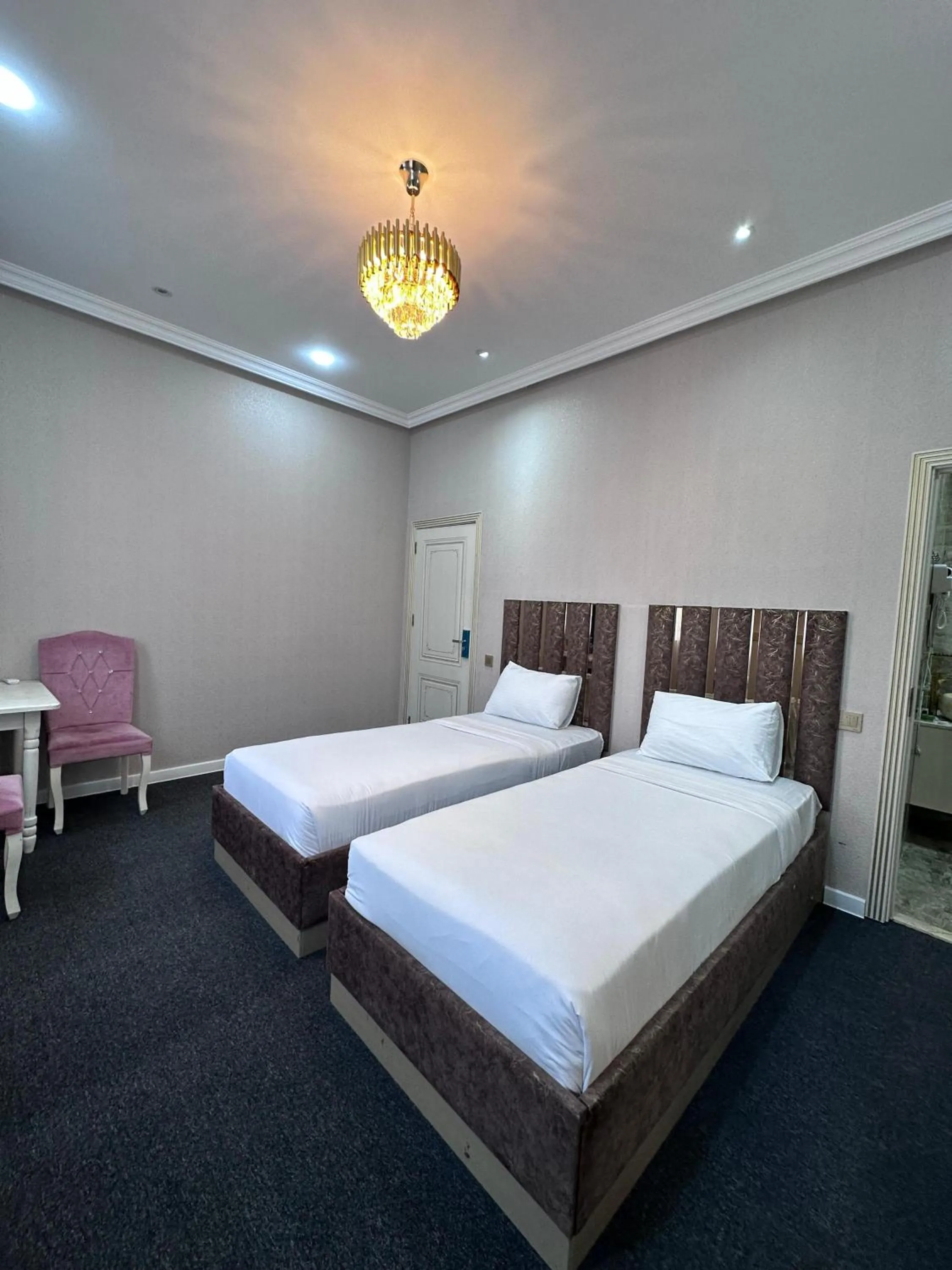 Bed in Central City Hotel