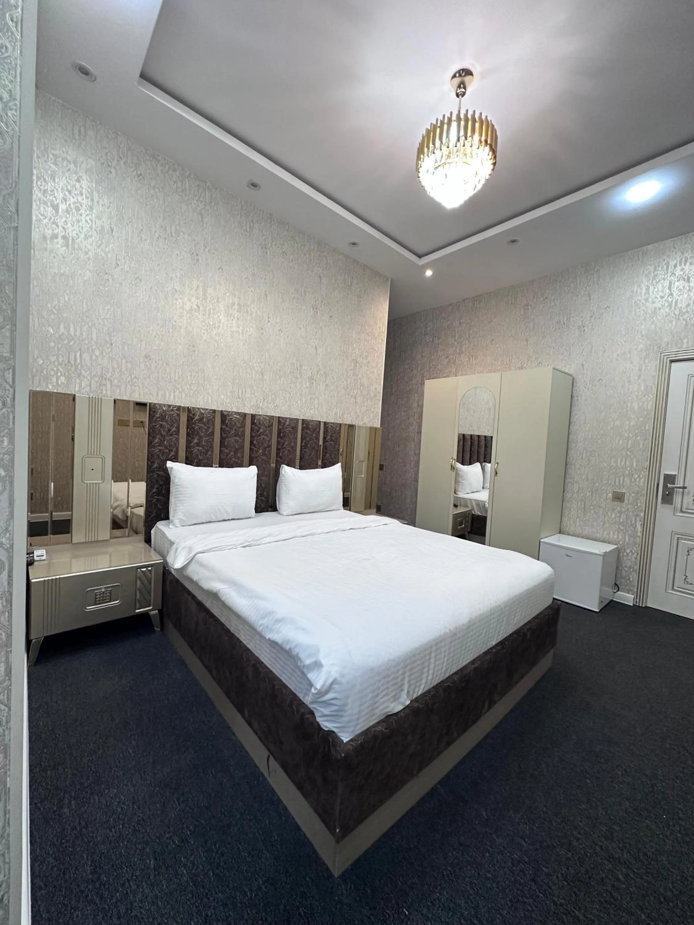 Bed in Central City Hotel