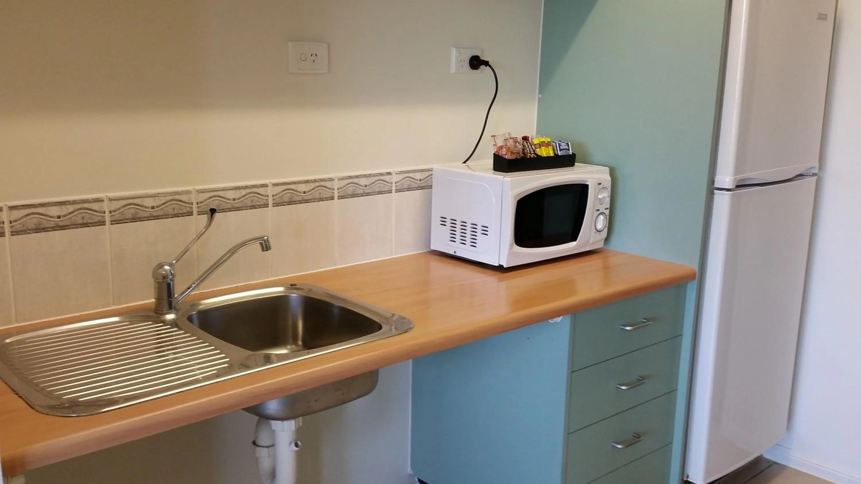 Living room in Port Denison Motor Inn