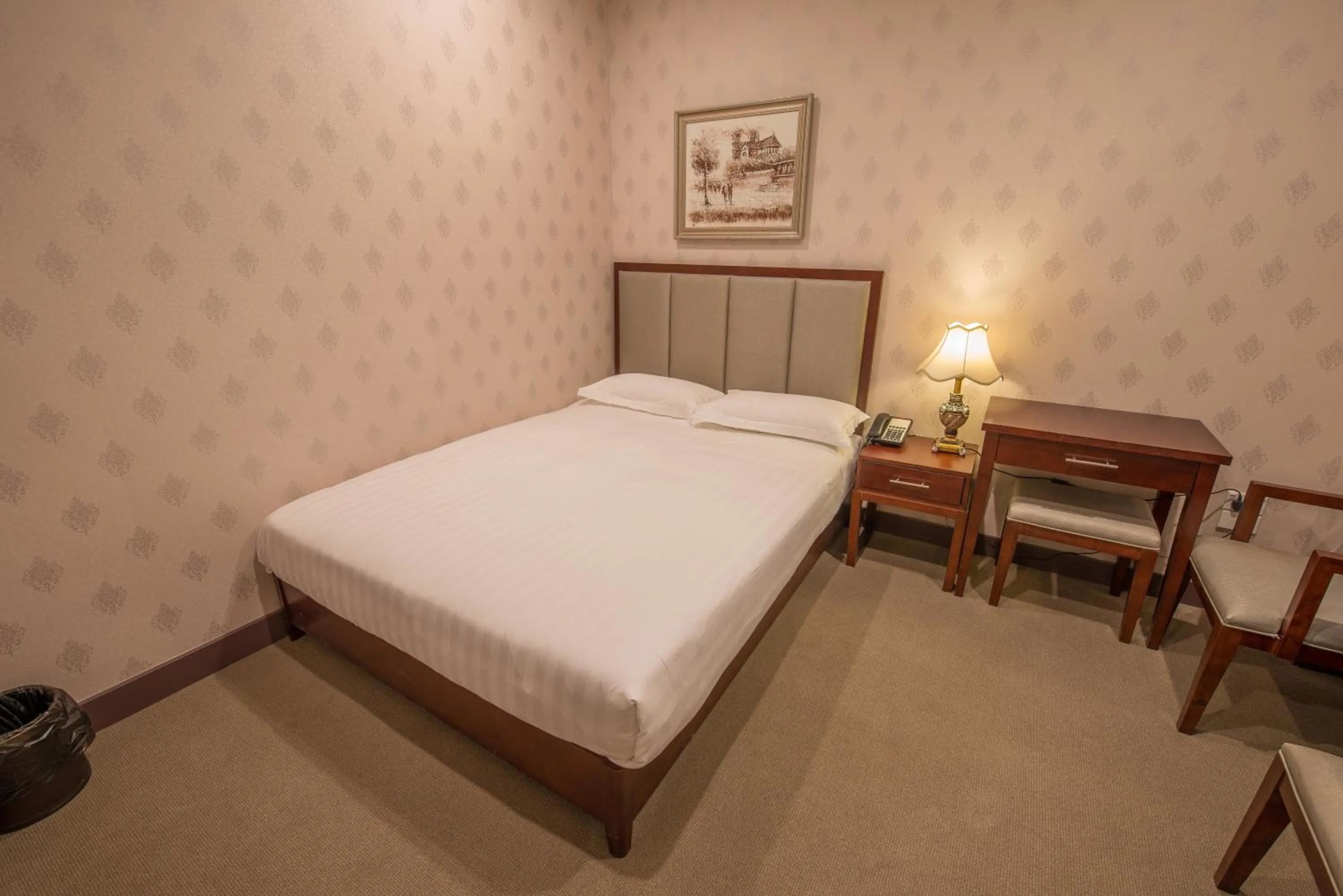 Bed in Megaboom City Hotel