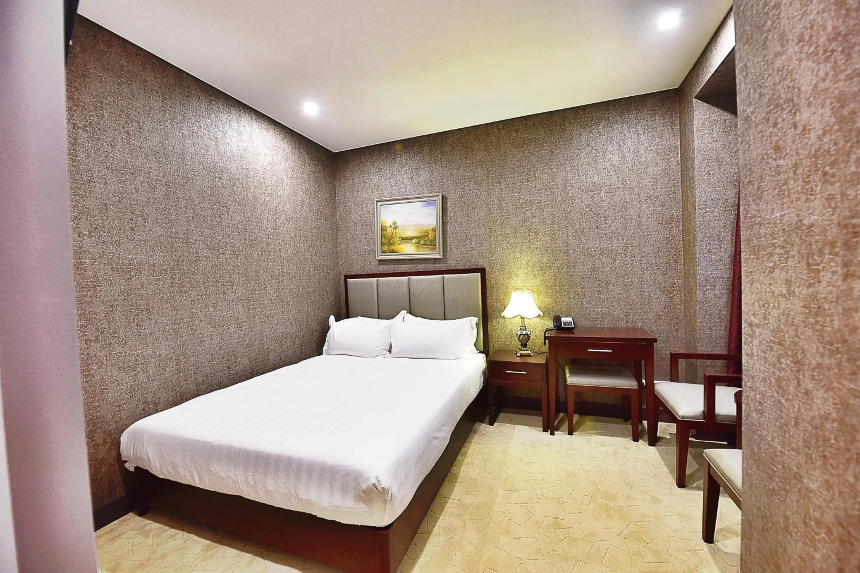 Bed in Megaboom City Hotel