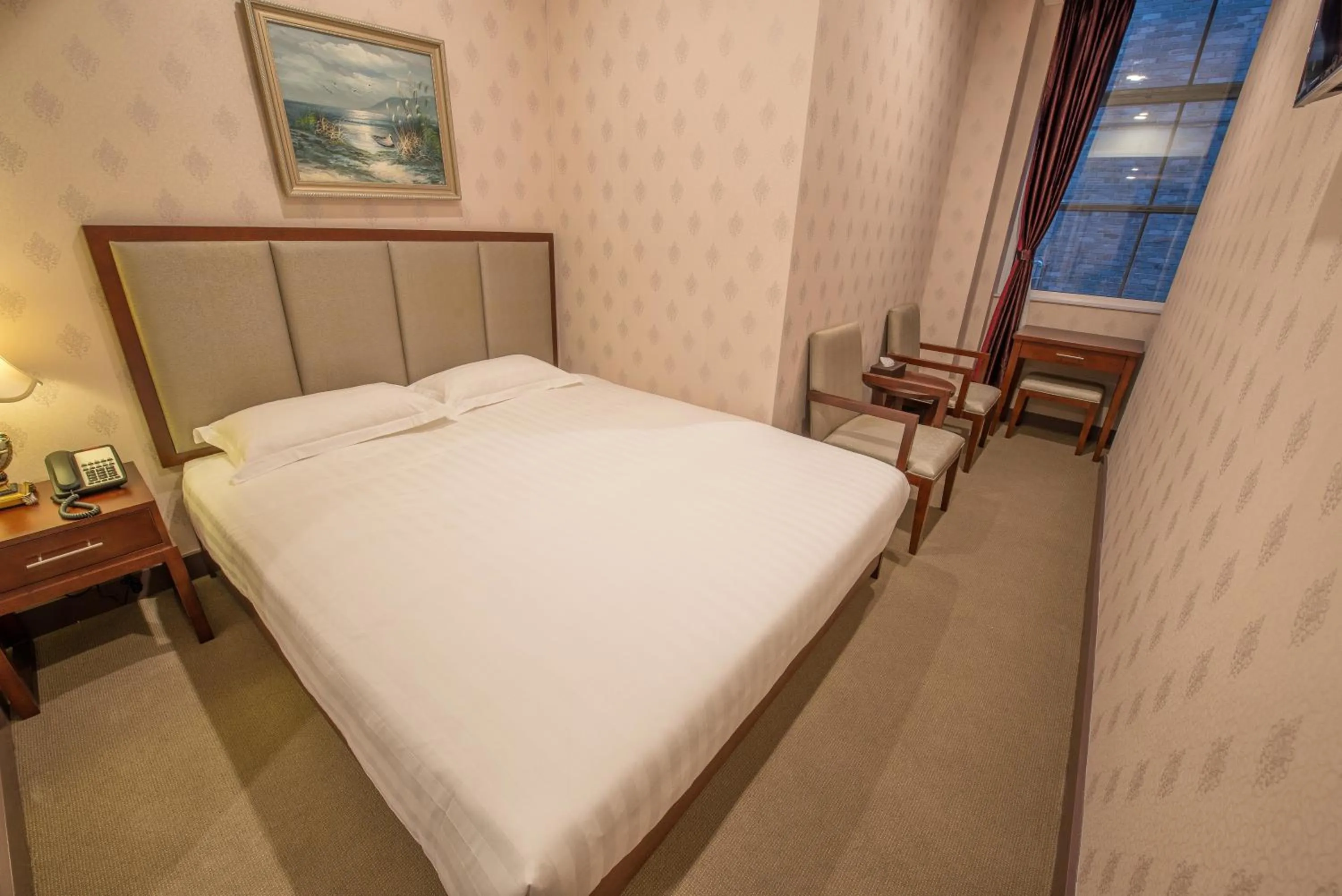 Bed in Megaboom City Hotel