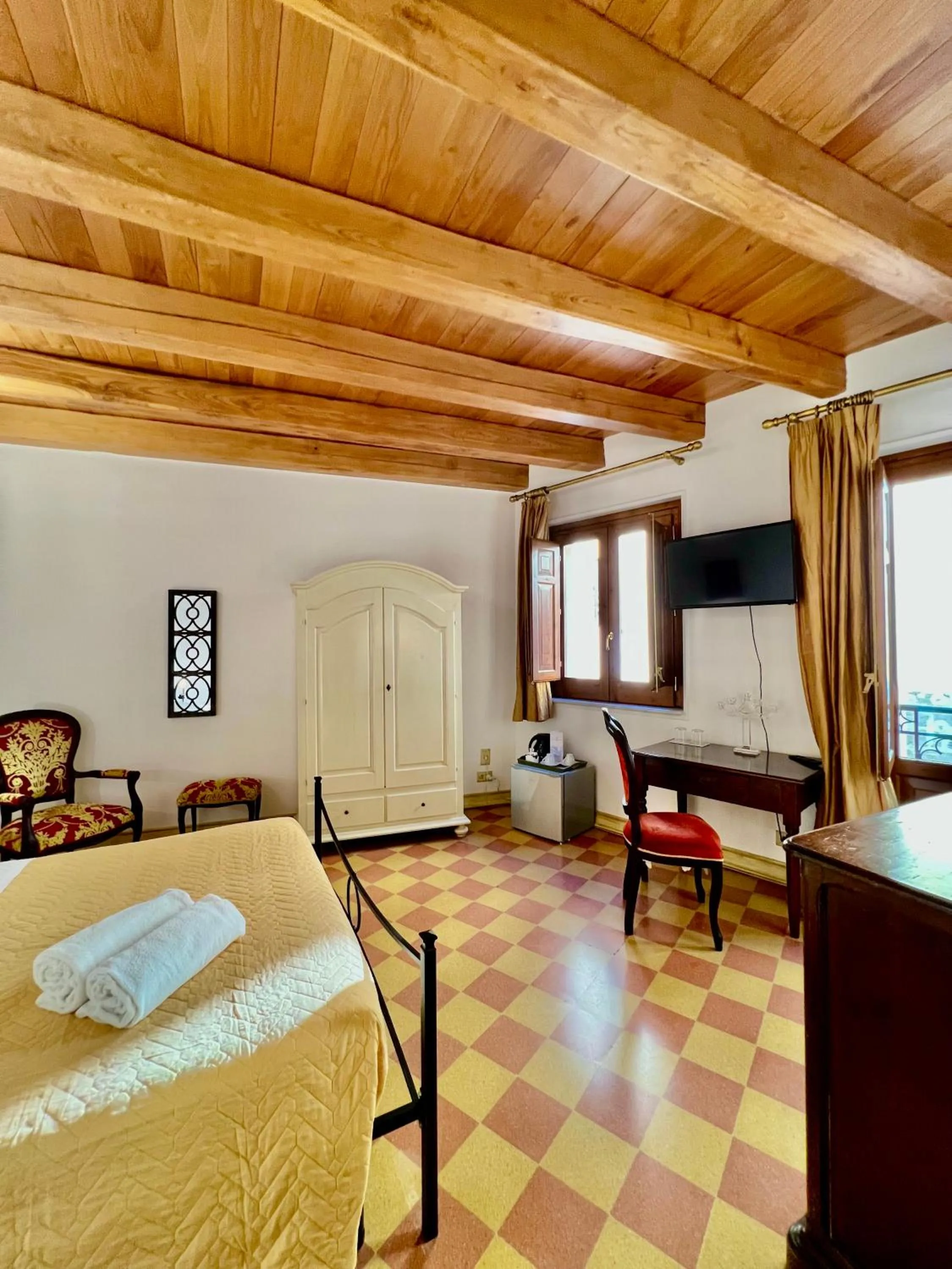 Bed in Atenea Luxury Suites - Atenea Collection