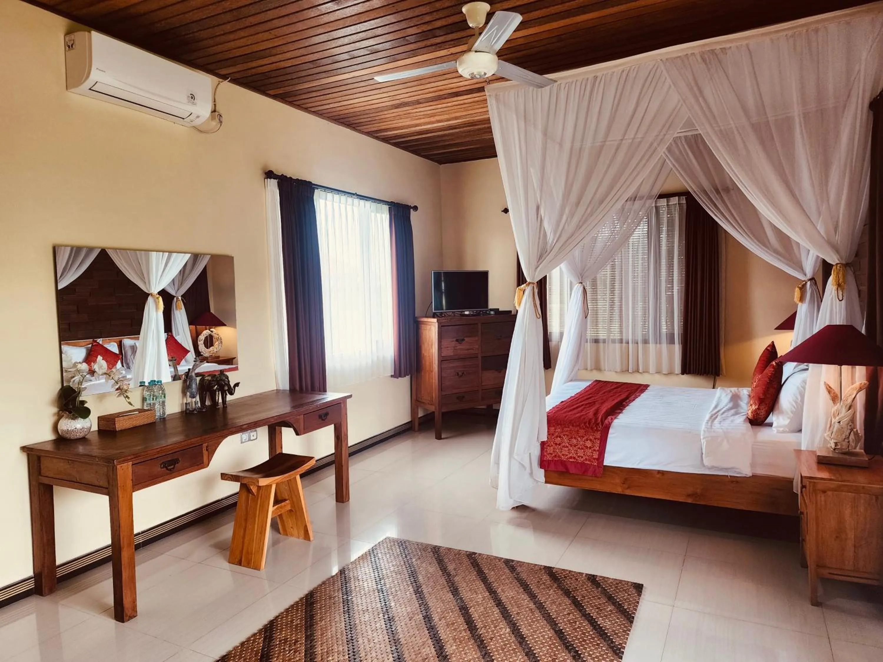 Bed in Uma Padi Villa